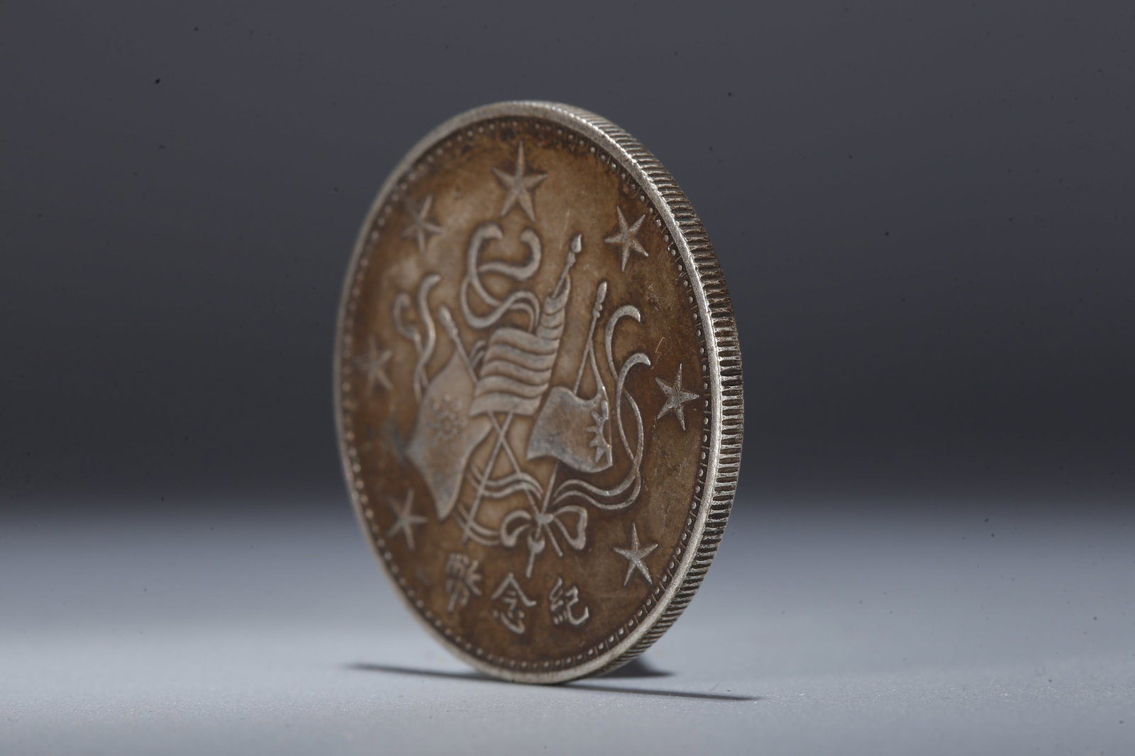 A SILVER DOLLAR COIN - 2