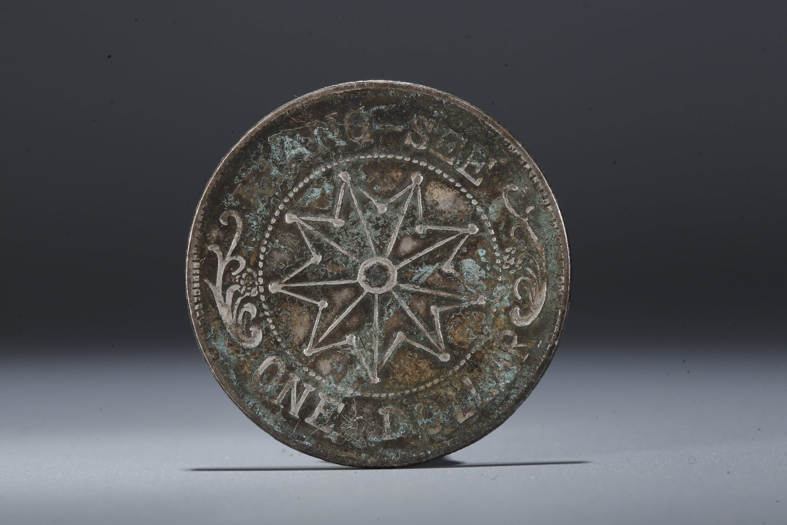 A SILVER DOLLAR COIN - 3