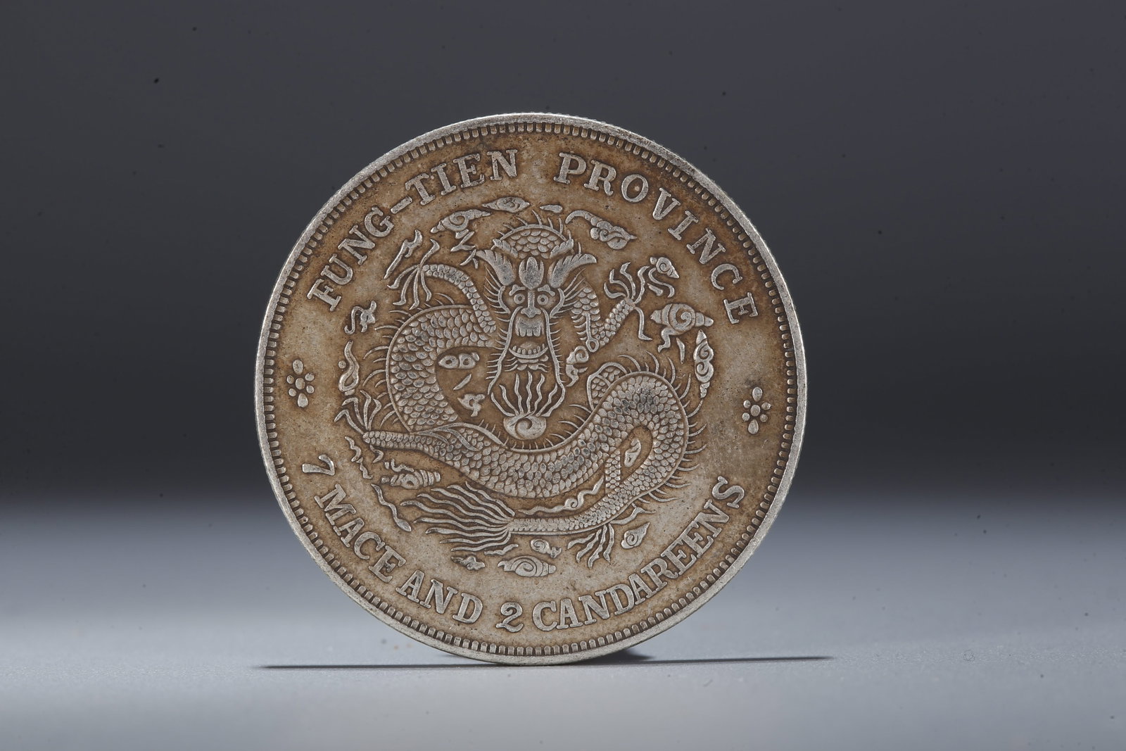 A SILVER DOLLAR COIN - 3
