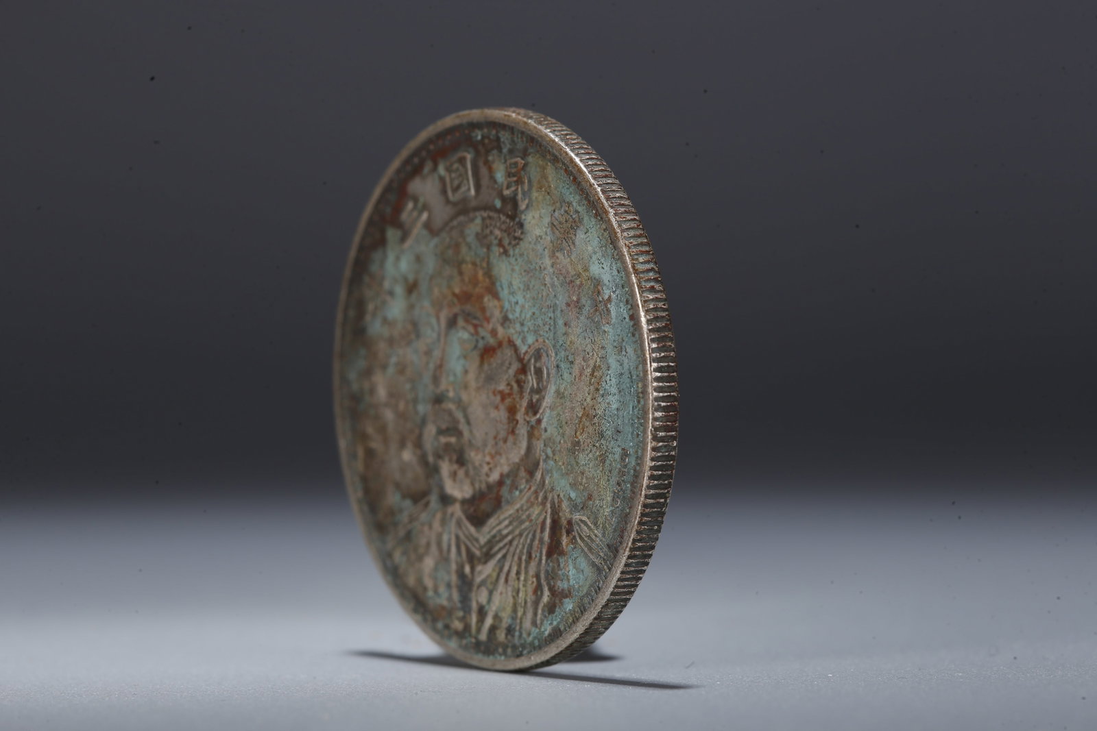 A SILVER DOLLAR COIN - 2