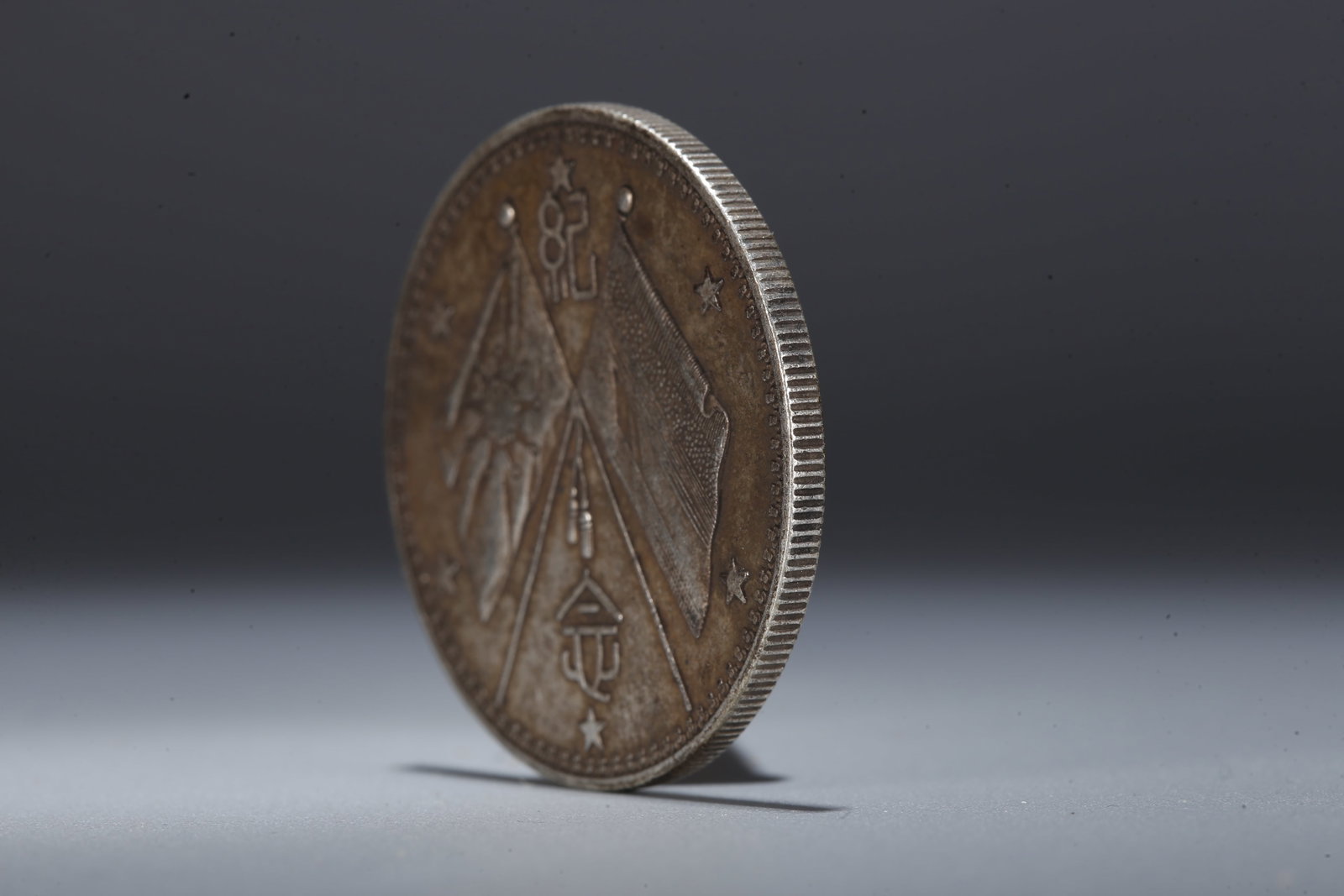 A SILVER DOLLAR COIN - 2