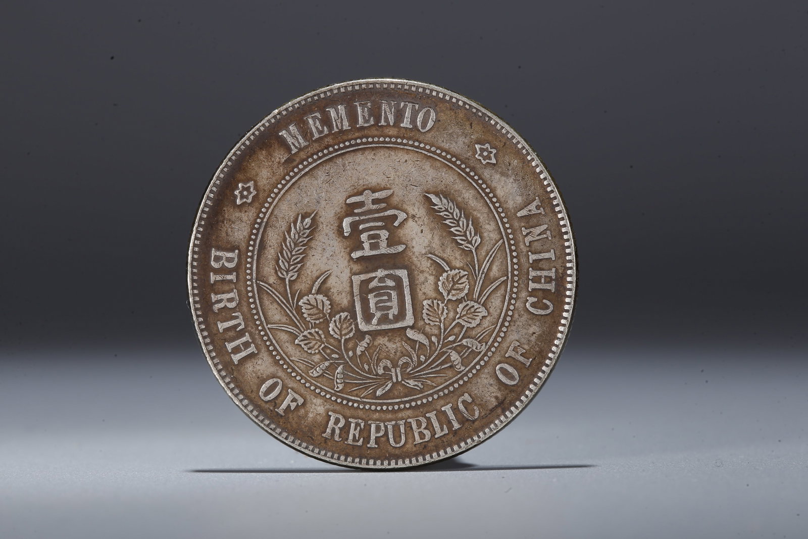 A SILVER DOLLAR COIN - 3