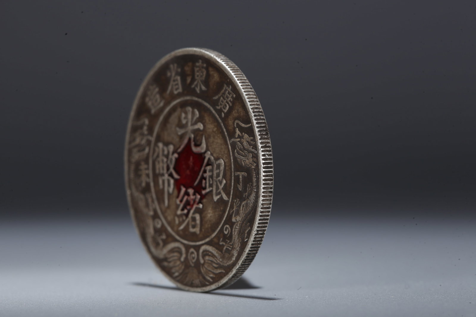 A SILVER DOLLAR COIN - 2