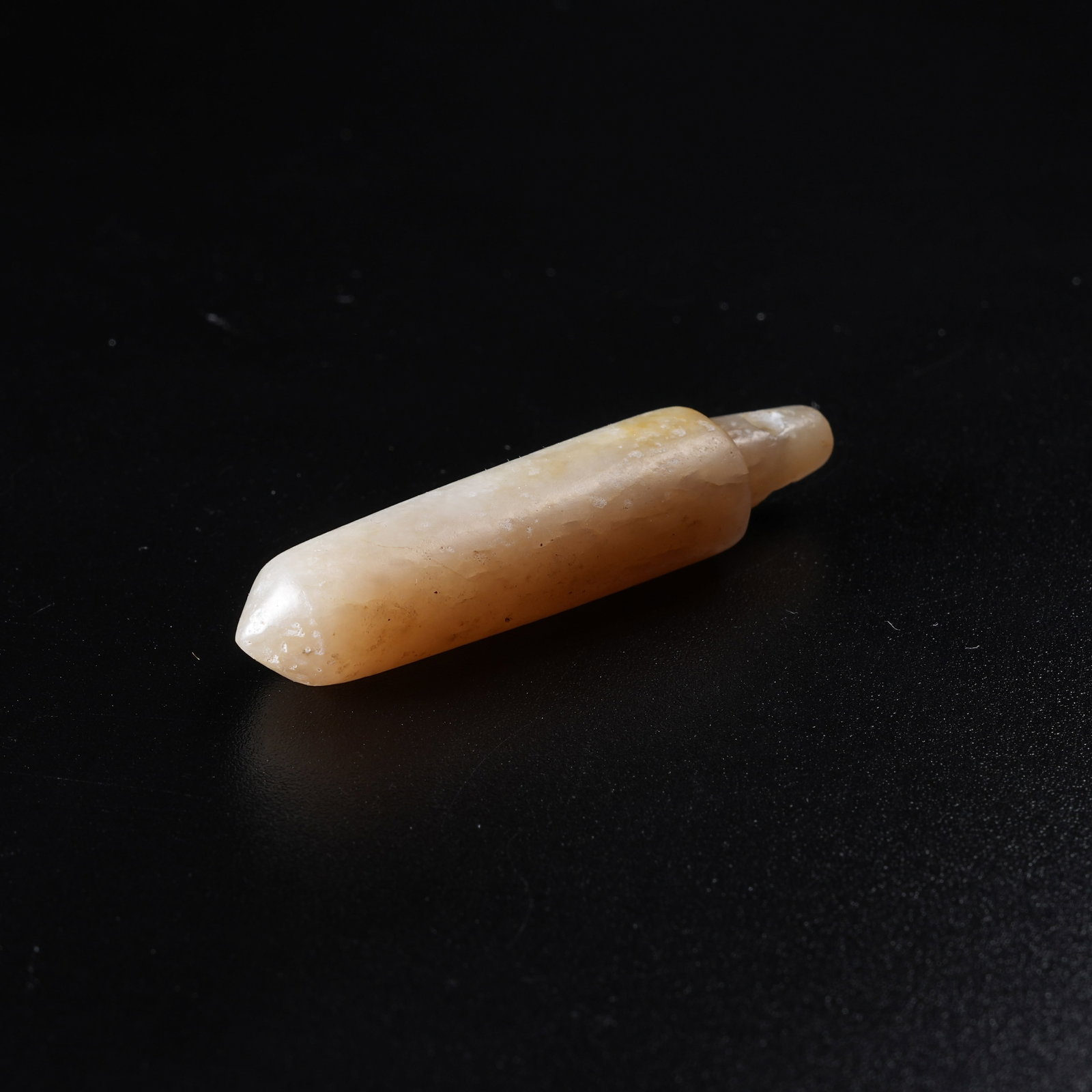 A ANCIENT JADE CONICAL PENDANT (1 of 7)