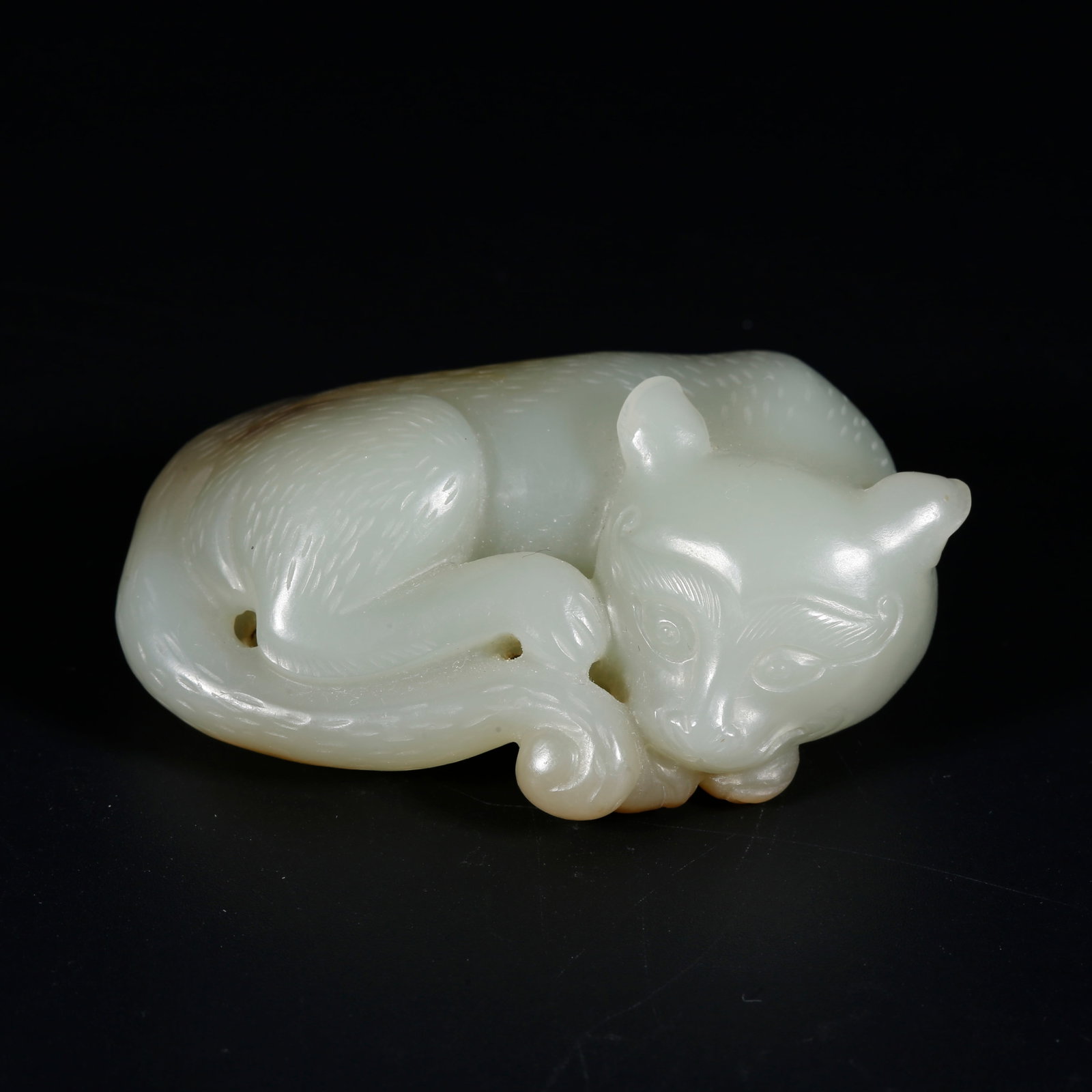 A HETIAN JADE FOX ORNAMENT (1 of 10)