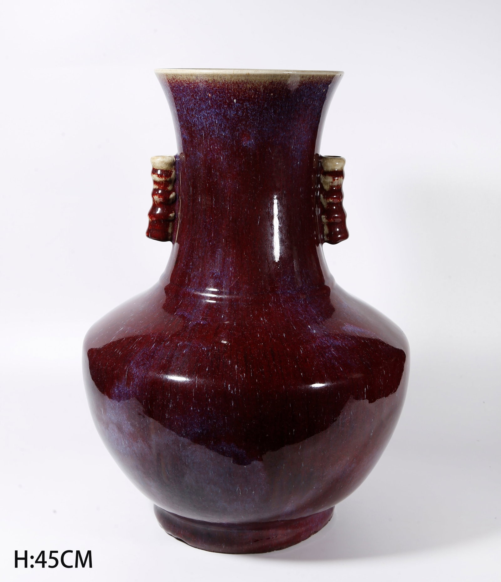 A FLAMBE GLAZE TUBE EAR VASE (1 of 9)