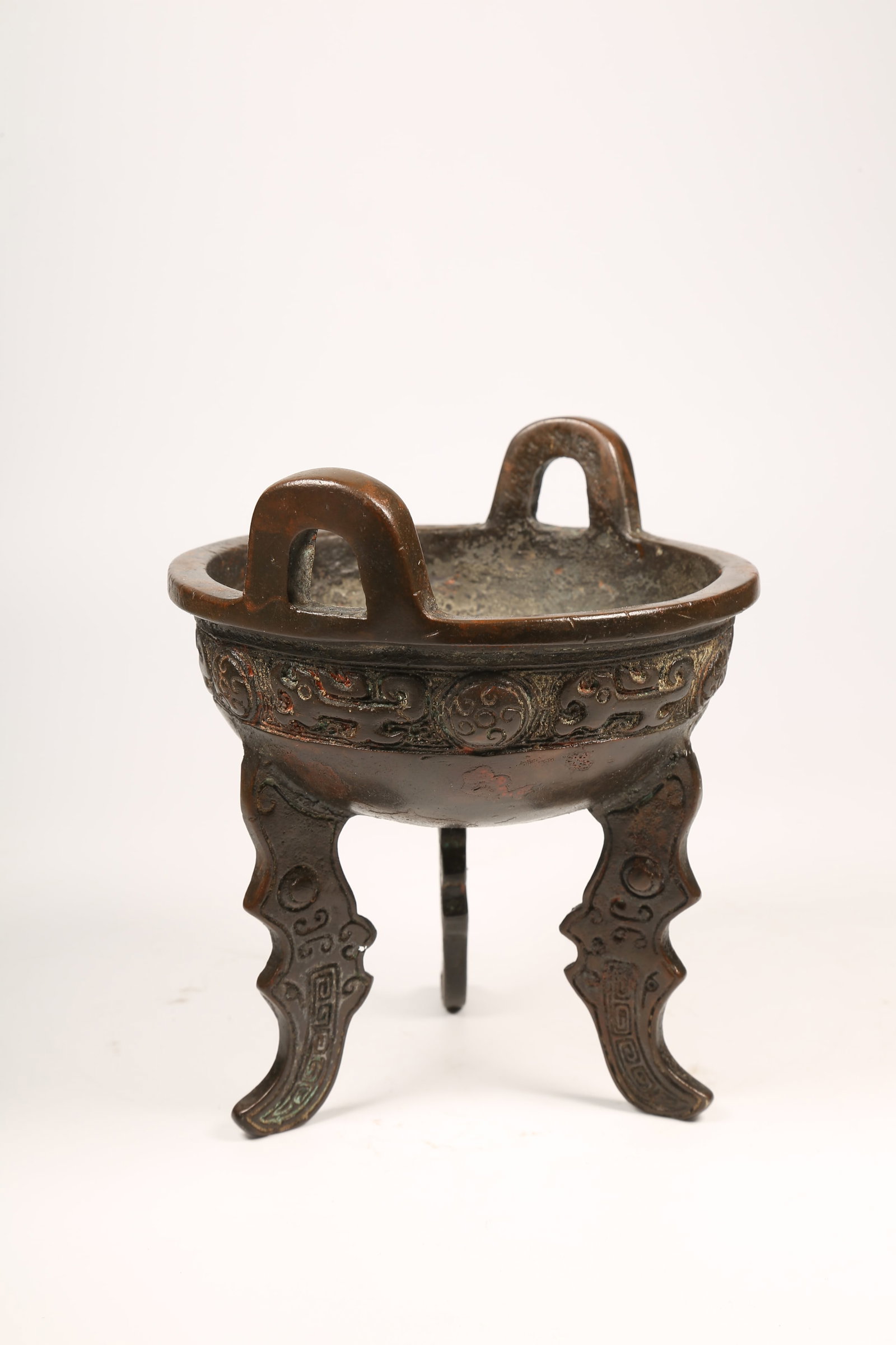 A BRONZE TRIPOD DING - 2