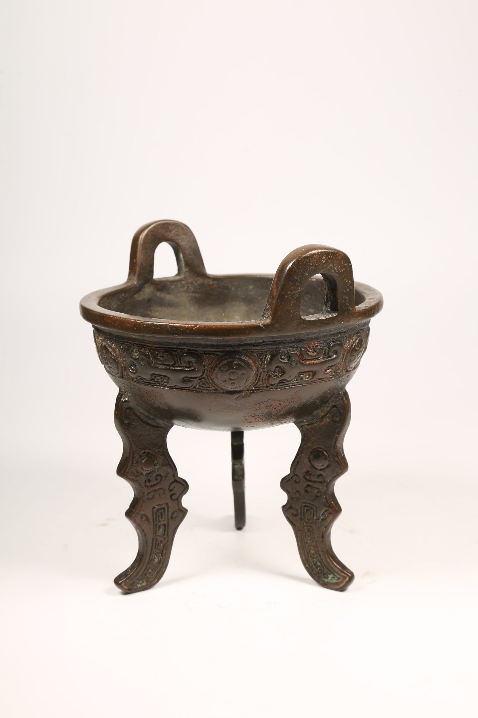 A BRONZE TRIPOD DING - 3