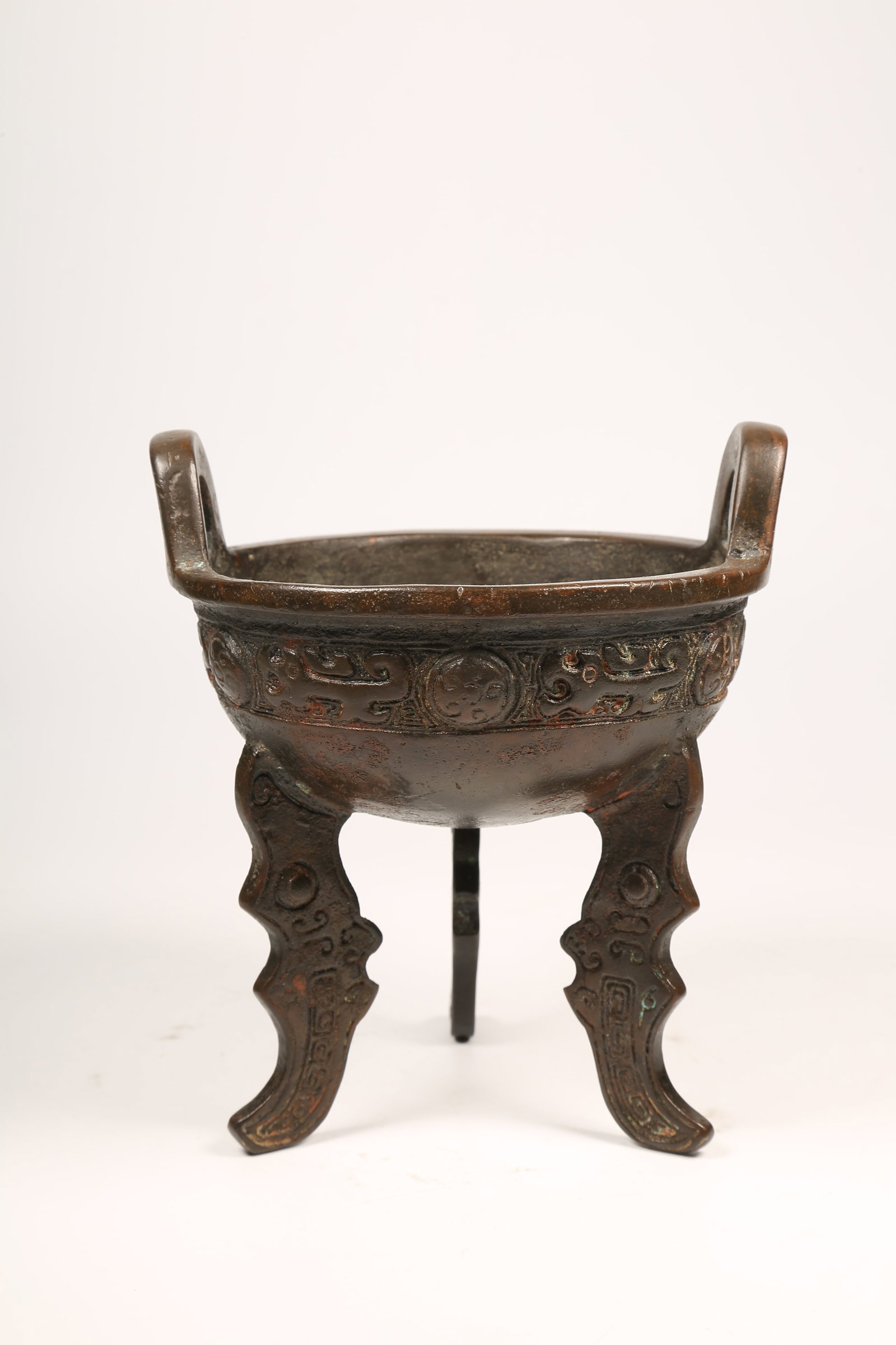 A BRONZE TRIPOD DING - 4