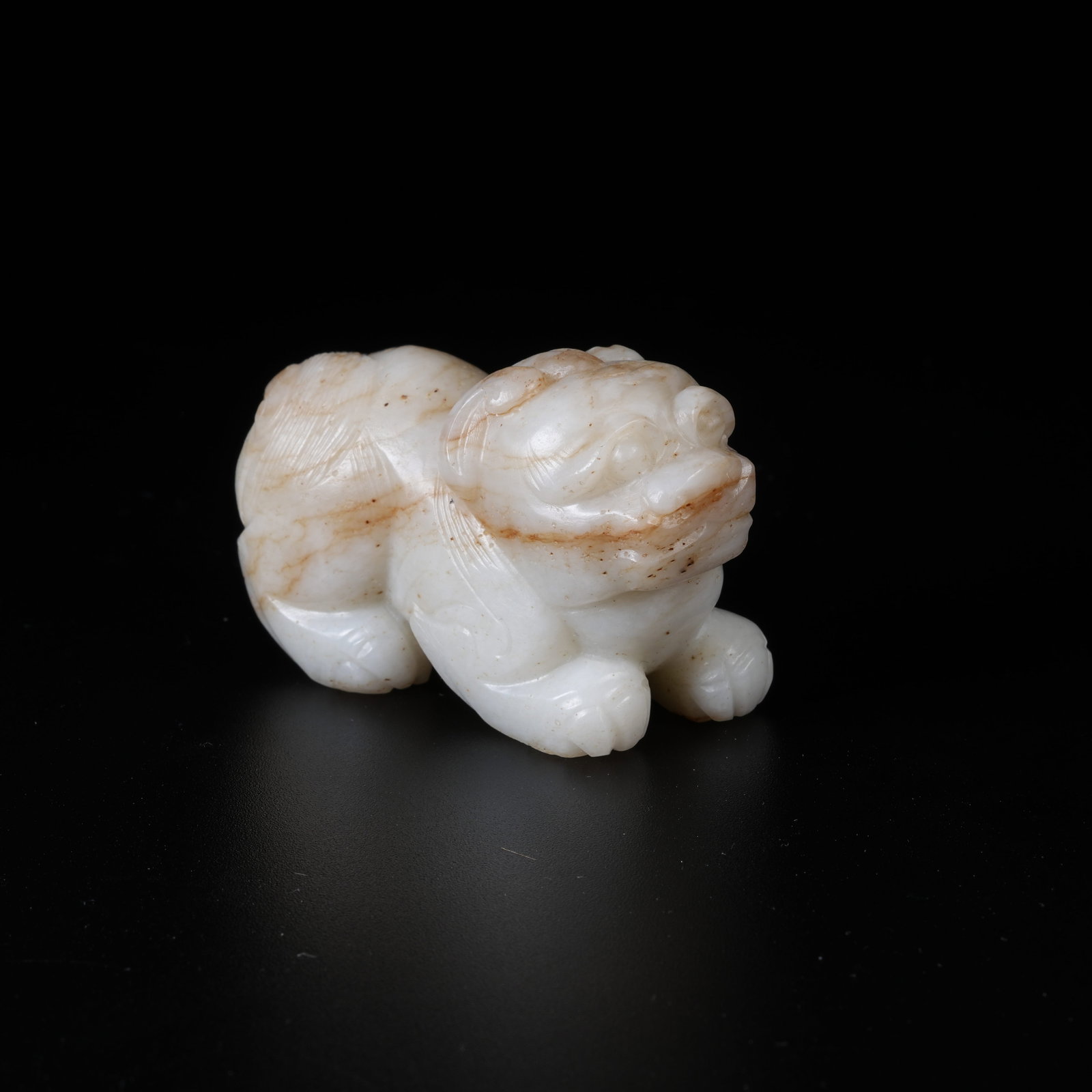 A MEDIEVAL JADE AUSPICIOUS BEAST ORNAMENT (1 of 8)