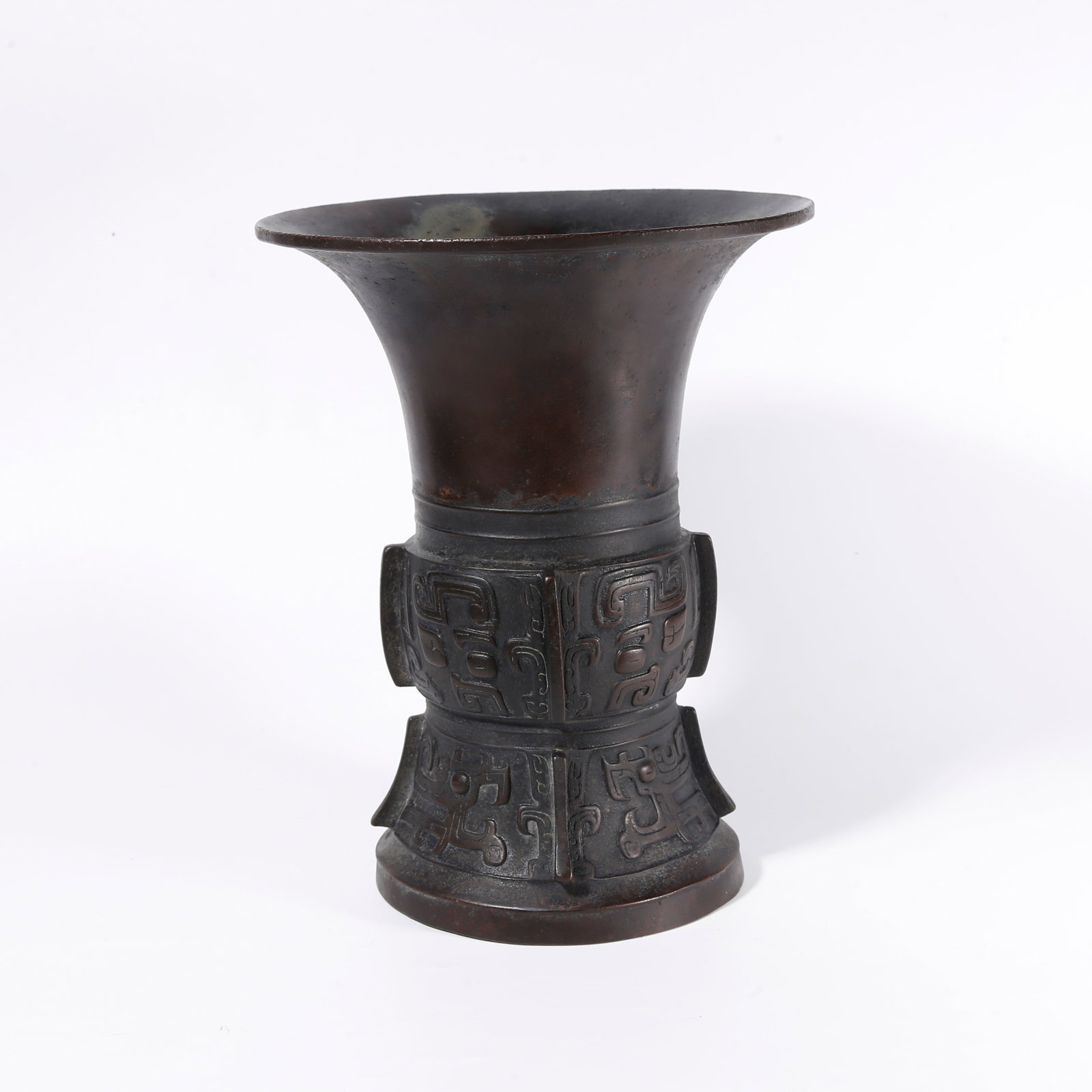 A BRONZE GU VASE WITH BEAST MASK PATTERNS: Bronze Gu Vase with Beast Mask Patterns