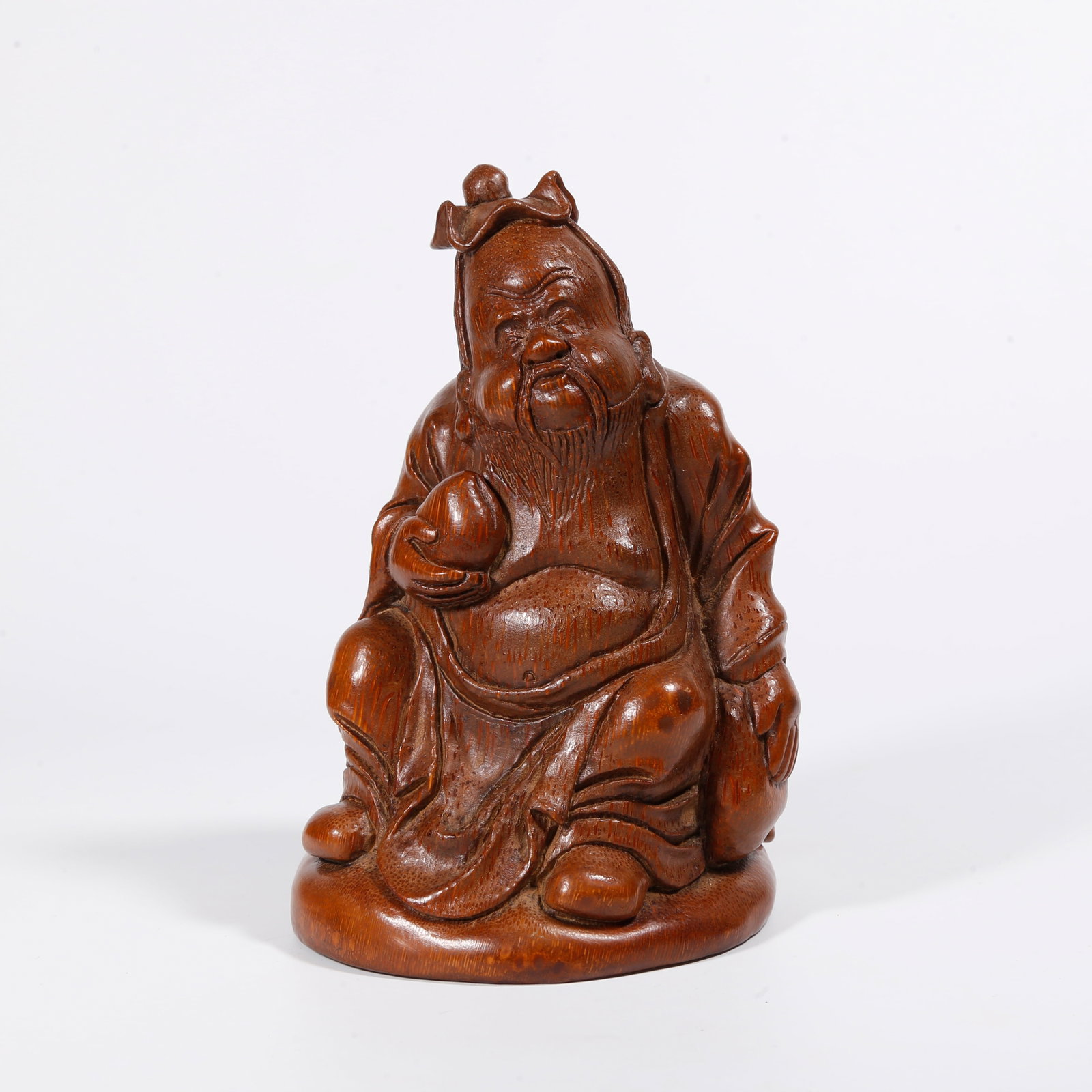 A BAMBOO CARVED STATUE OF DONGFANG SHUO: Bamboo Carved Statue of Dongfang Shuo
