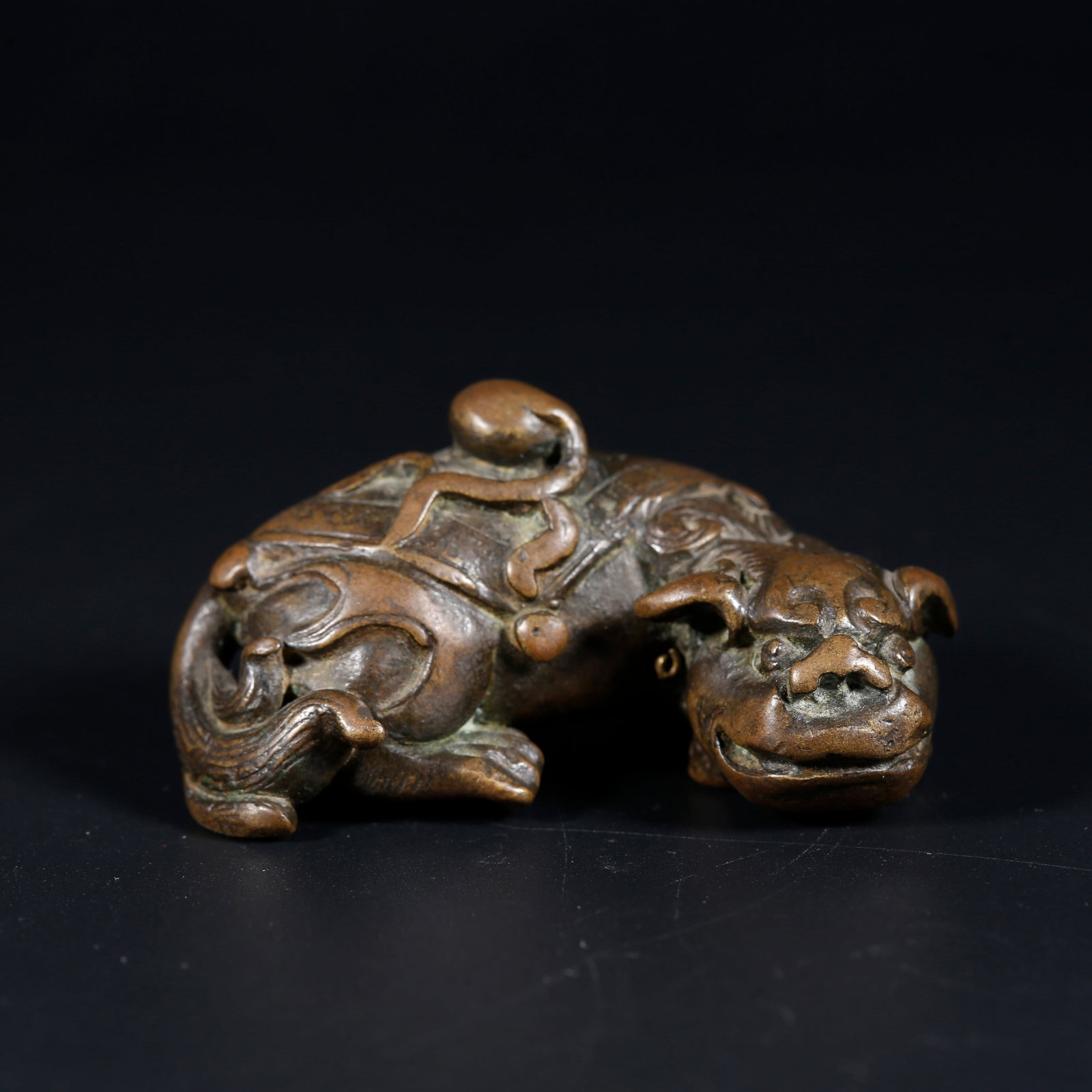 A BRONZE BEAST PAPERWEIGHT (1 of 9)