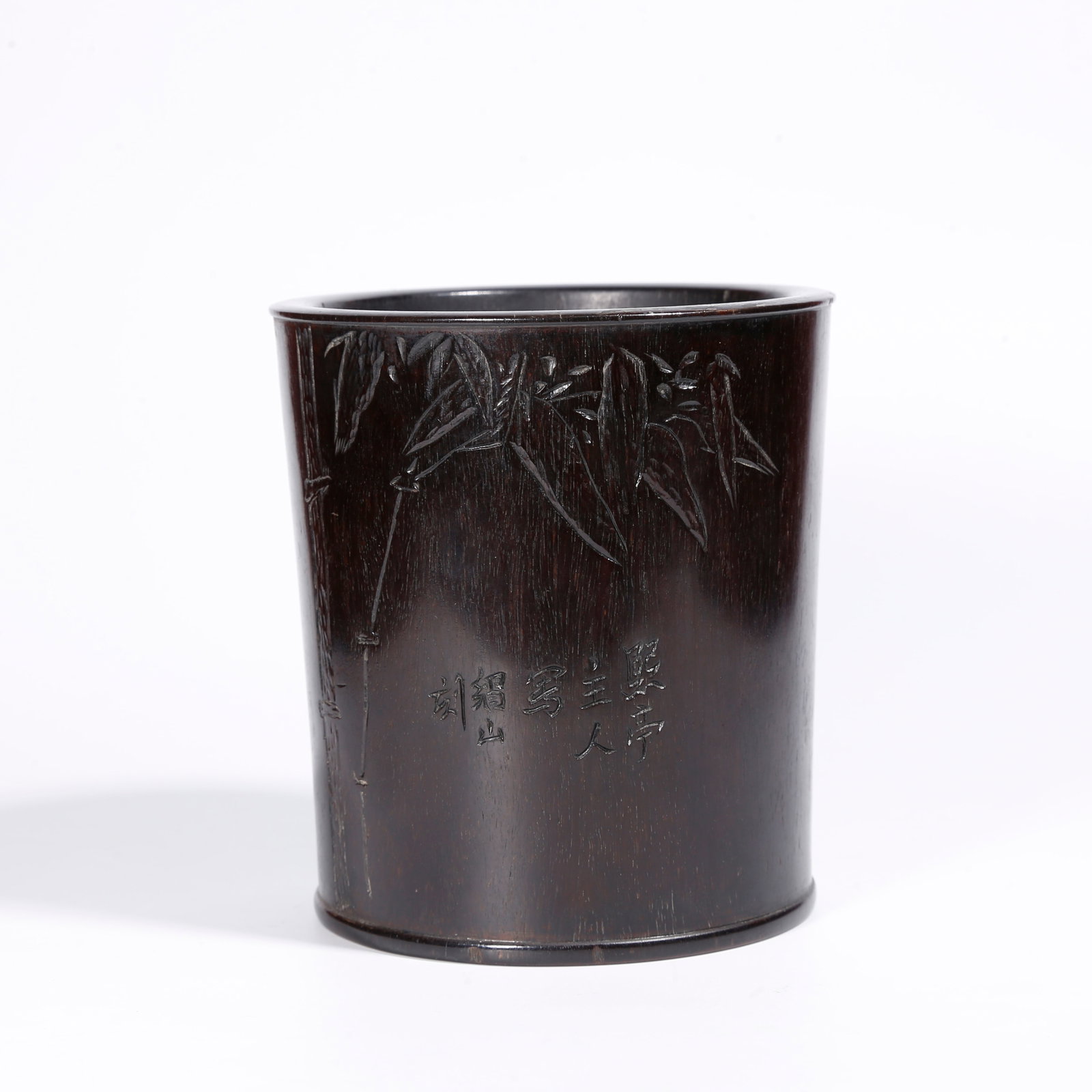 A RED SANDALWOOD BRUSH POT CARVED WITH BAMBOO MOTIFS (1 of 9)