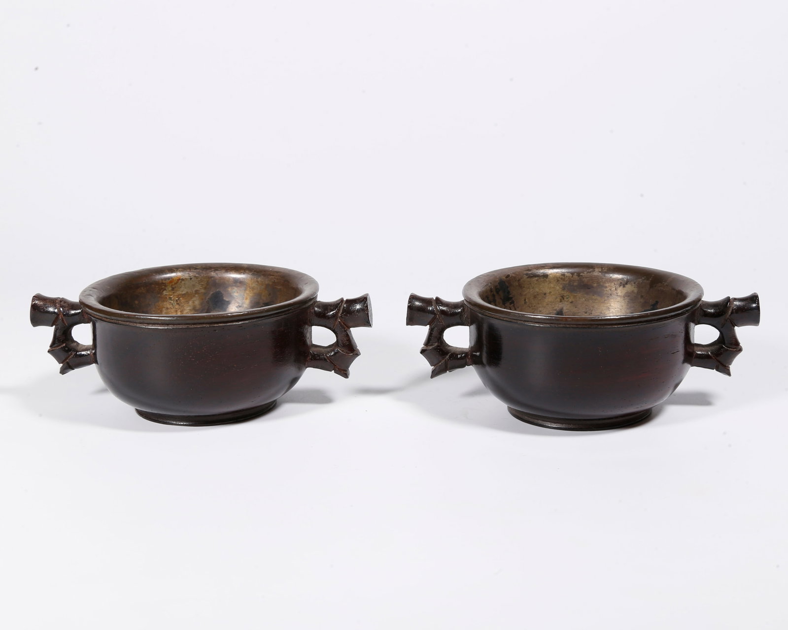 A SILVER-WRAPPED RED SANDALWOOD TWIN-EAR CUPS (PAIR): Silver-wrapped Red Sandalwood Twin-ear Cups (Pair)