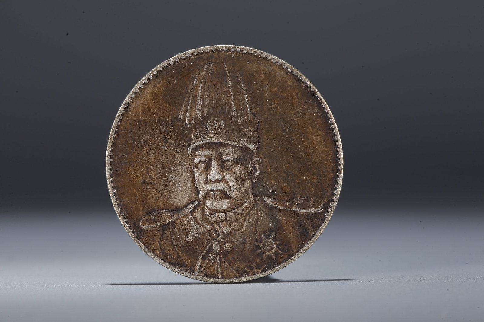 A SILVER DOLLAR COIN - 3