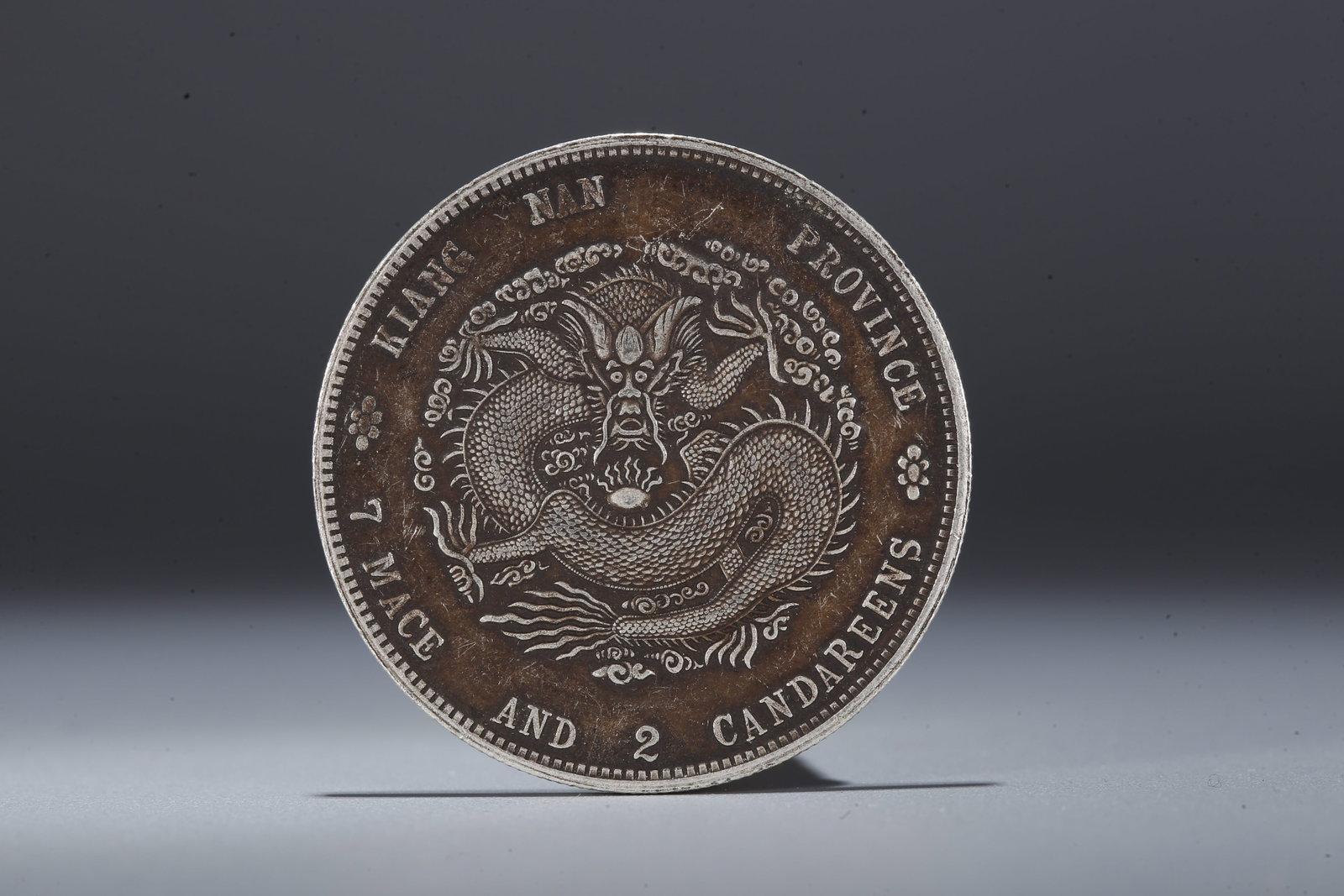 A SILVER DOLLAR COIN - 3