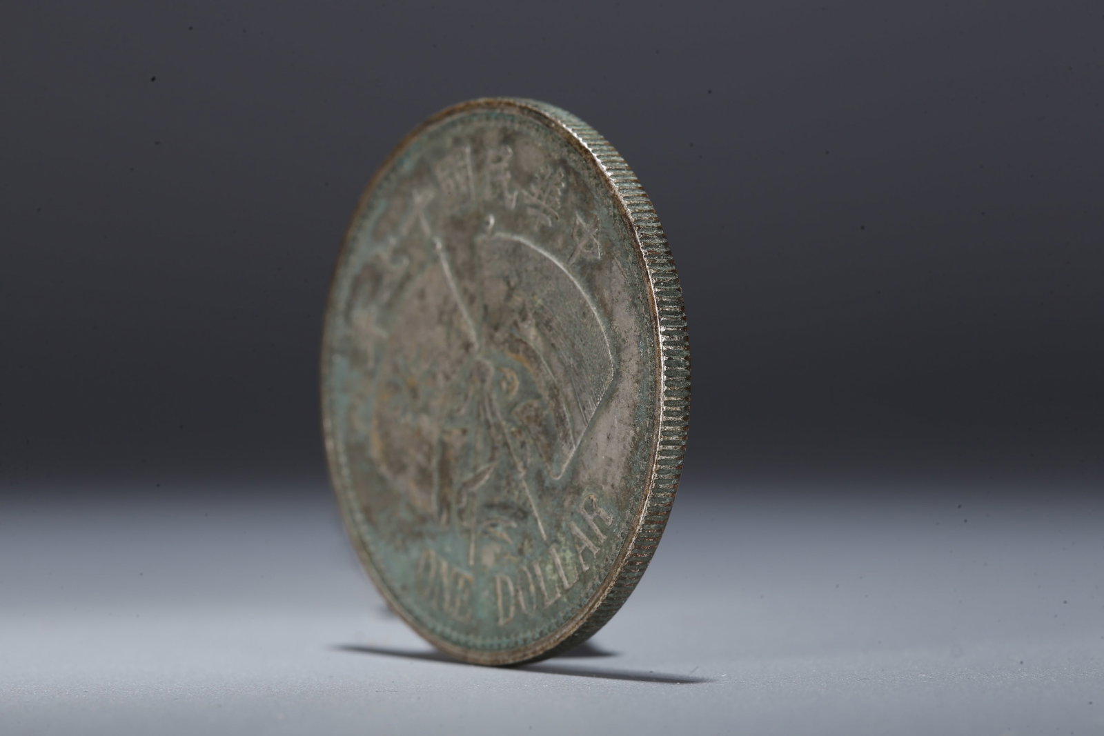 A SILVER DOLLAR COIN - 2