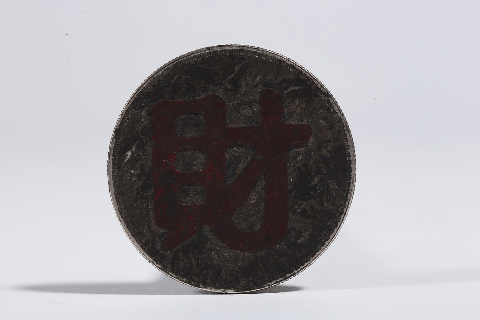 A SILVER DOLLAR COIN - 3