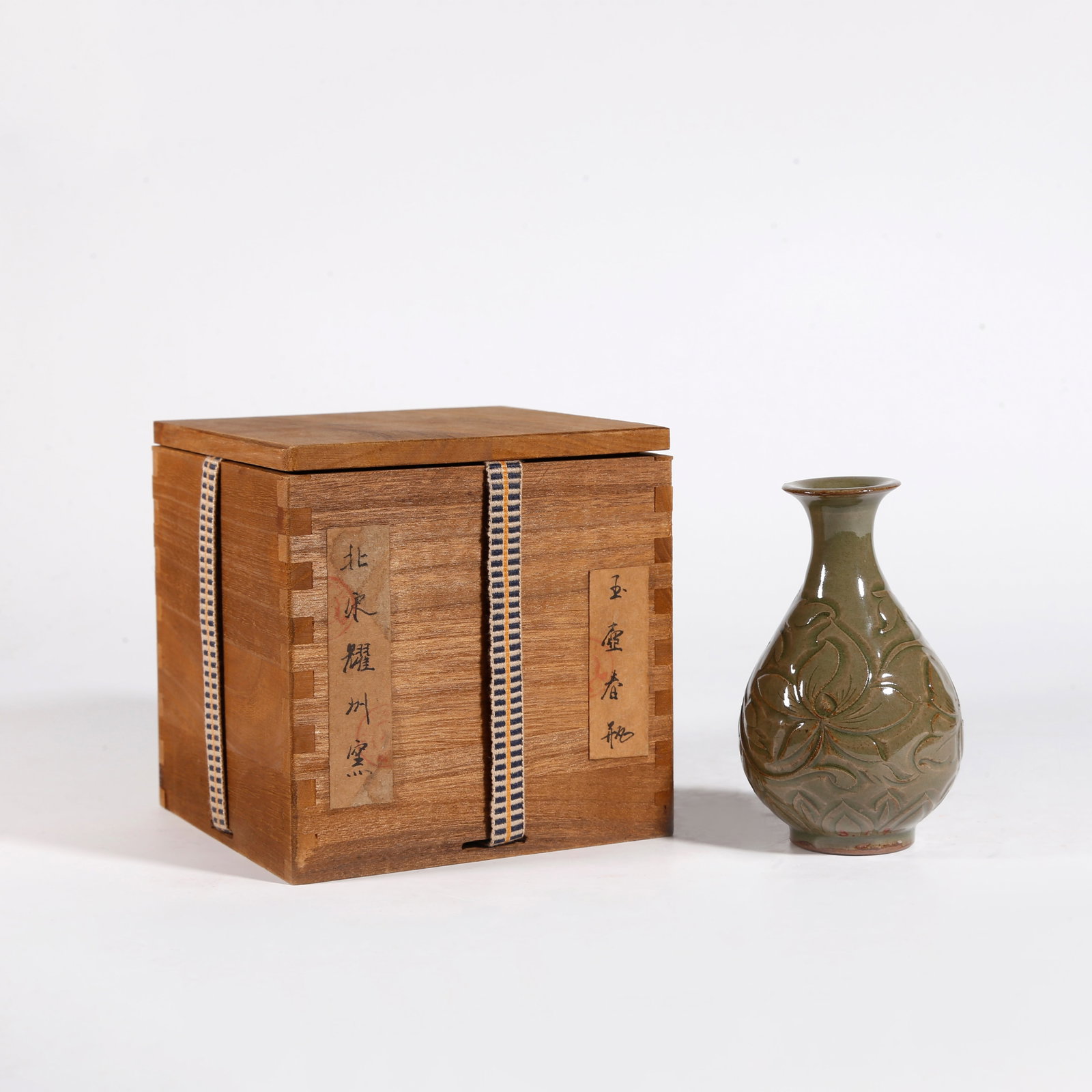A YAOZHOU KILN PEAR-SHAPED SPRING VASE: Yaozhou Kiln Pear-shaped Spring Vase