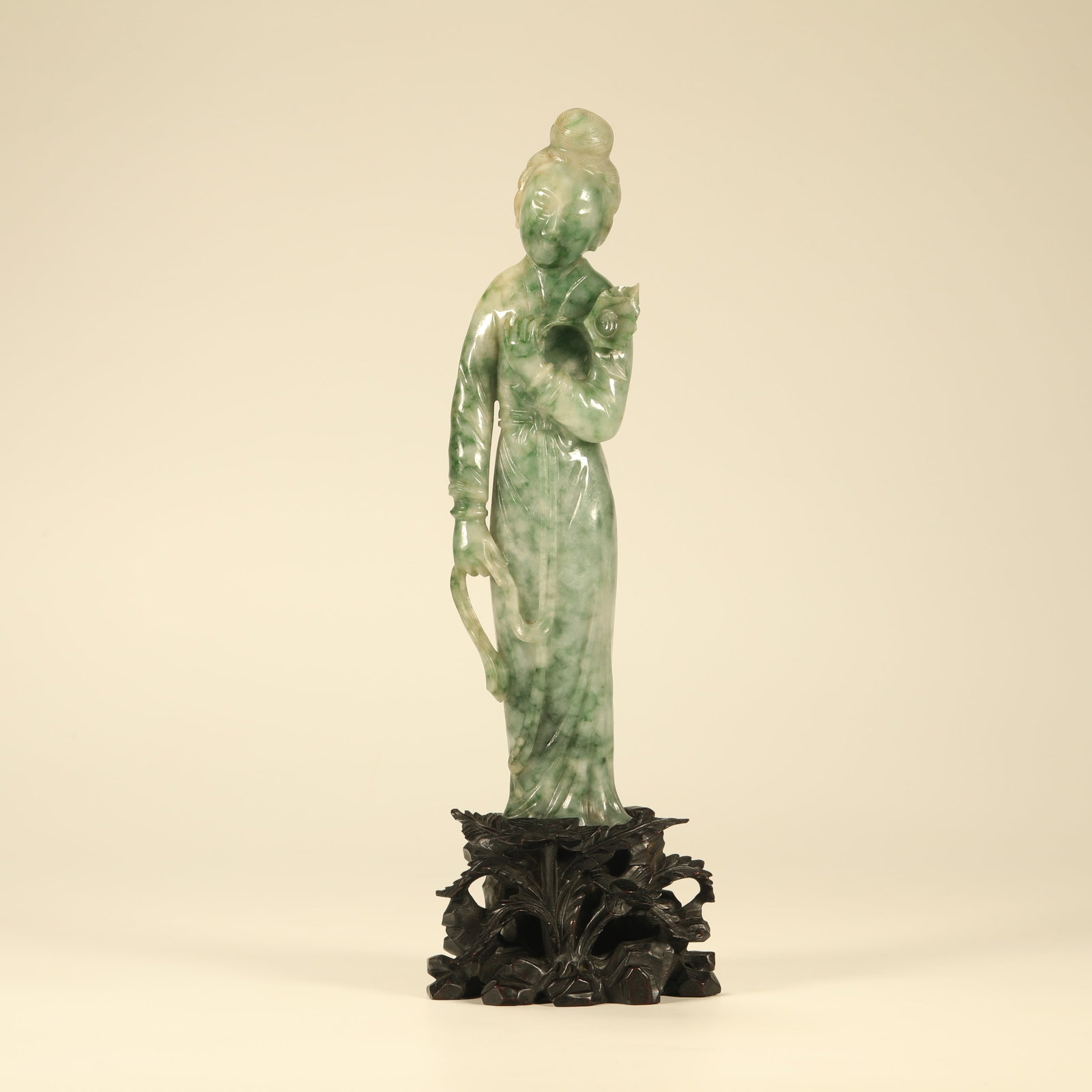 A JADEITE FIGURE OF ATTENDANT LADY: Jadeite Figure of Attendant Lady