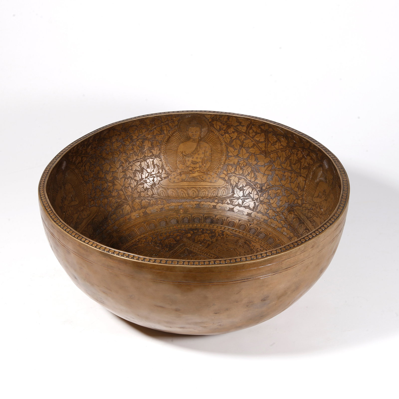 A BRONZE BUDDHIST SINGING BOWL: Bronze Buddhist Singing Bowl