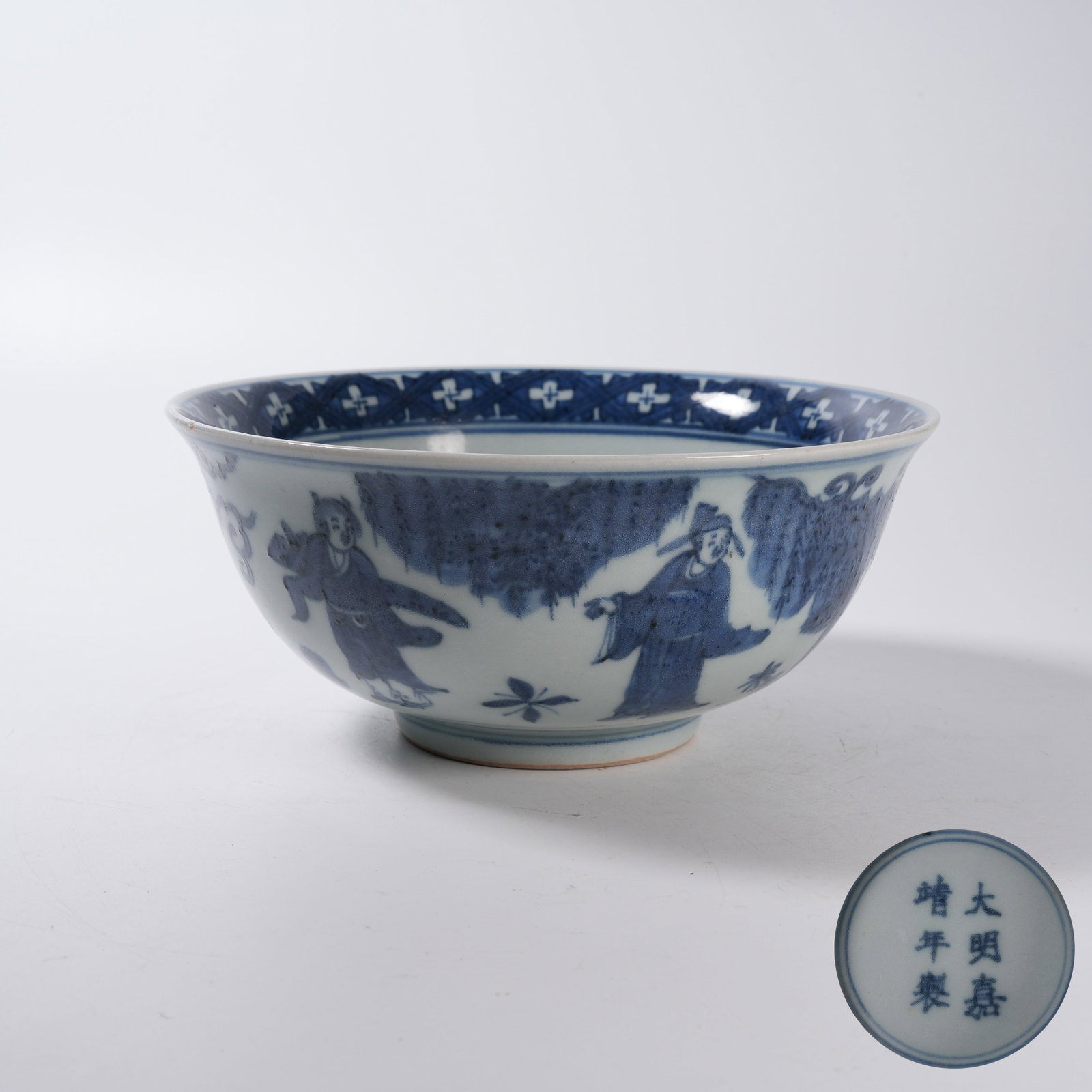 A BLUE AND WHITE BOWL WITH EIGHT IMMORTALS PATTERN: Blue and White Bowl with Eight Immortals Pattern
