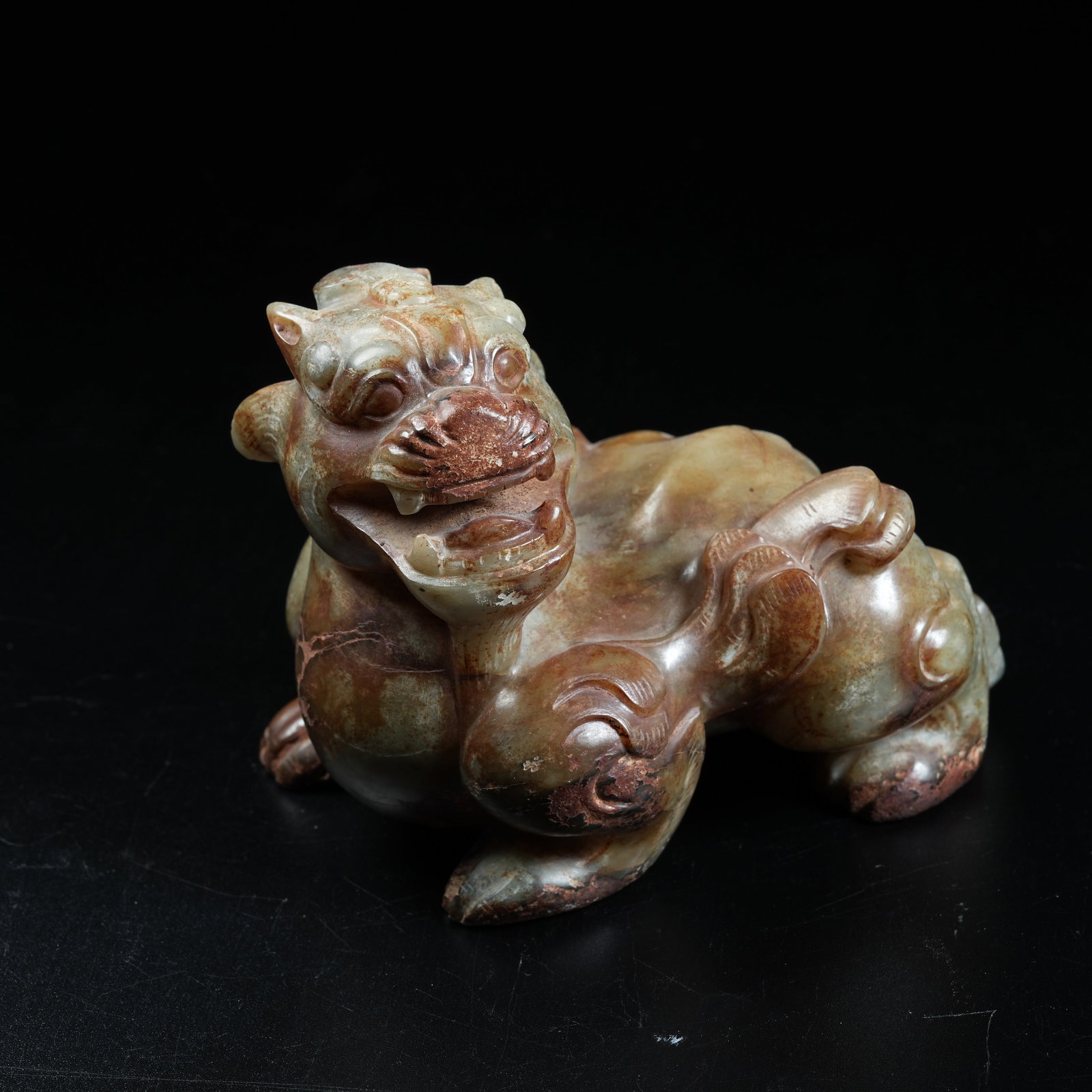 A ANCIENT JADE AUSPICIOUS BEAST ORNAMENT (1 of 10)
