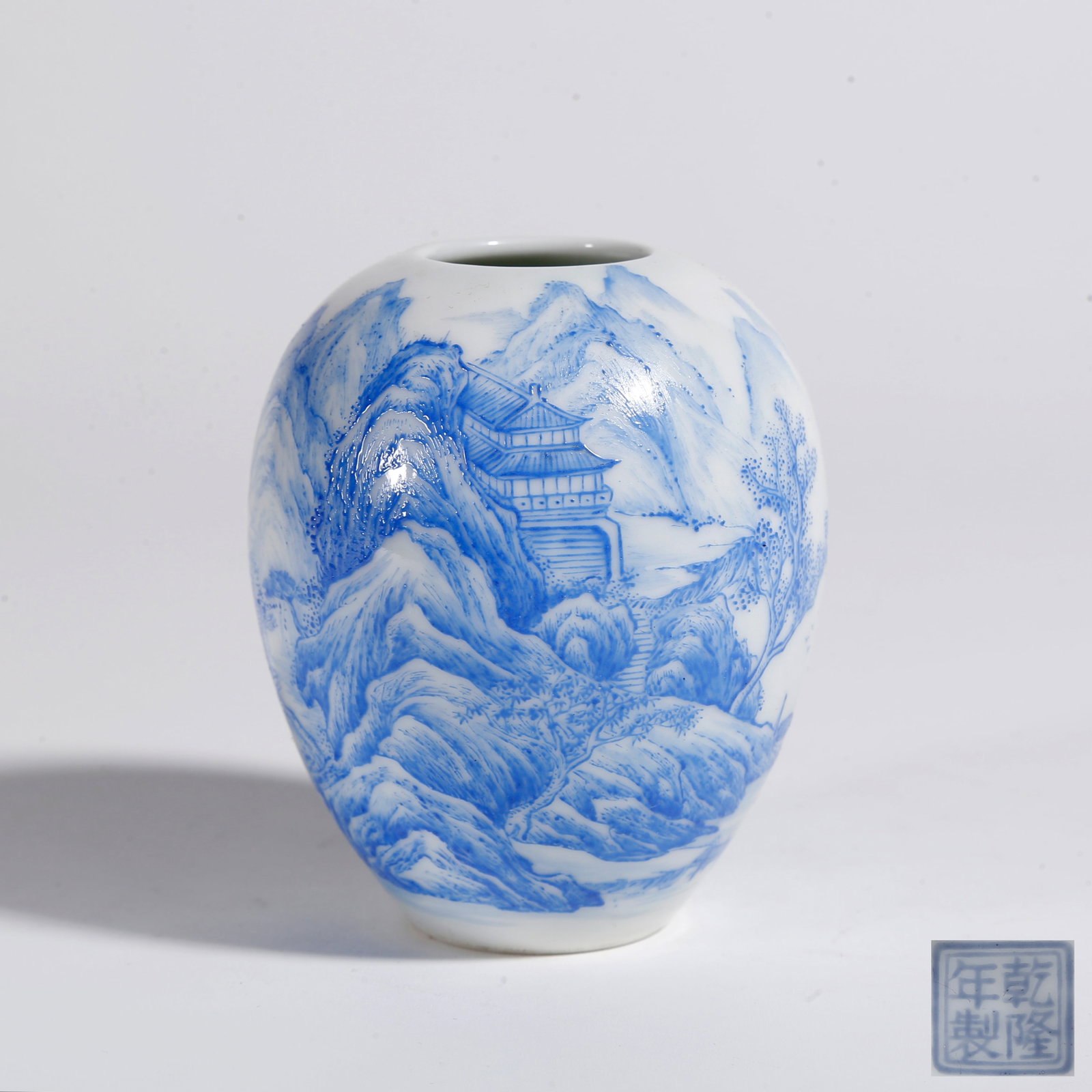 A BLUE AND WHITE LANDSCAPE PATTERN WATER CONTAINER (1 of 9)