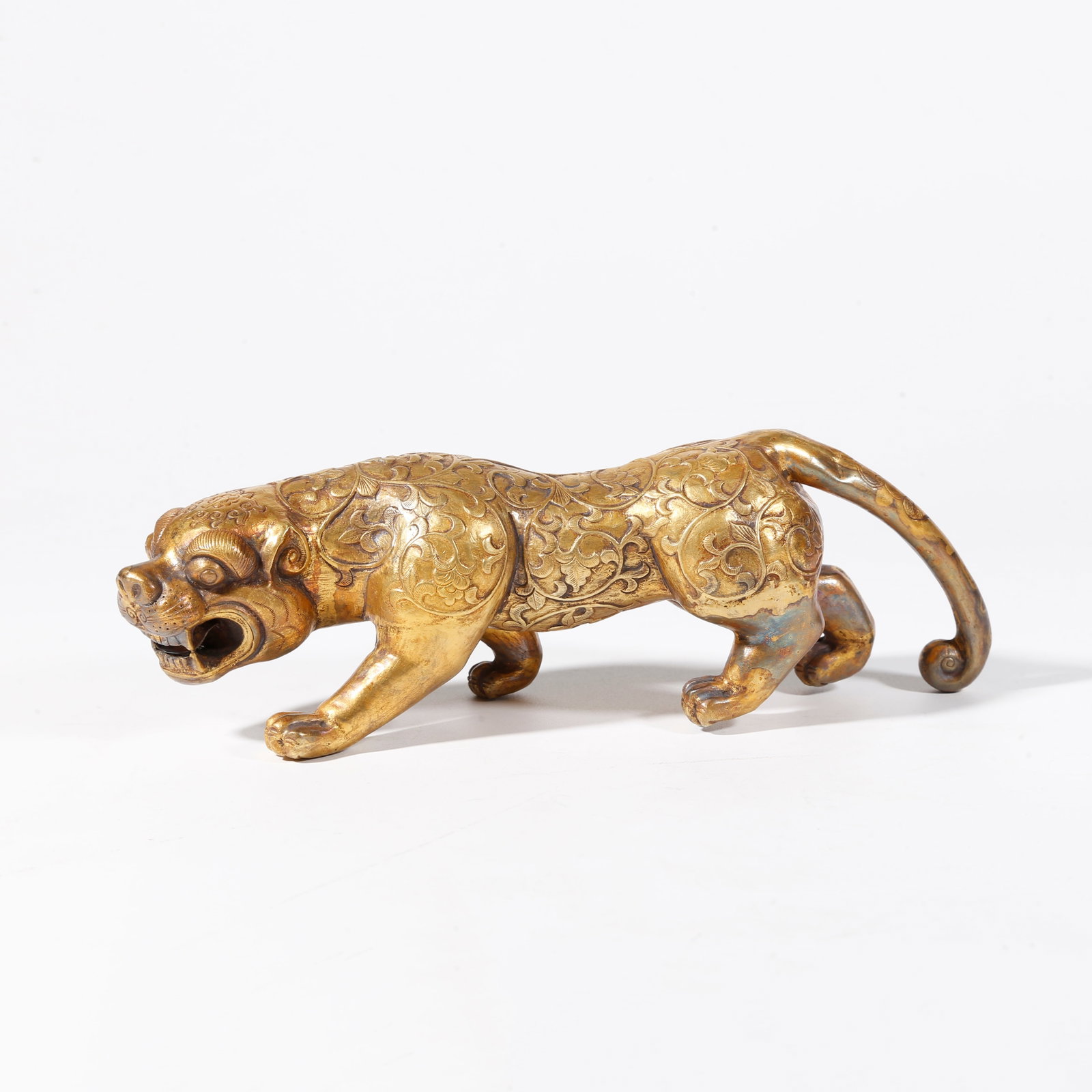 A GILT BRONZE BEAST-SHAPED ORNAMENT: Gilt Bronze Beast-shaped Ornament
