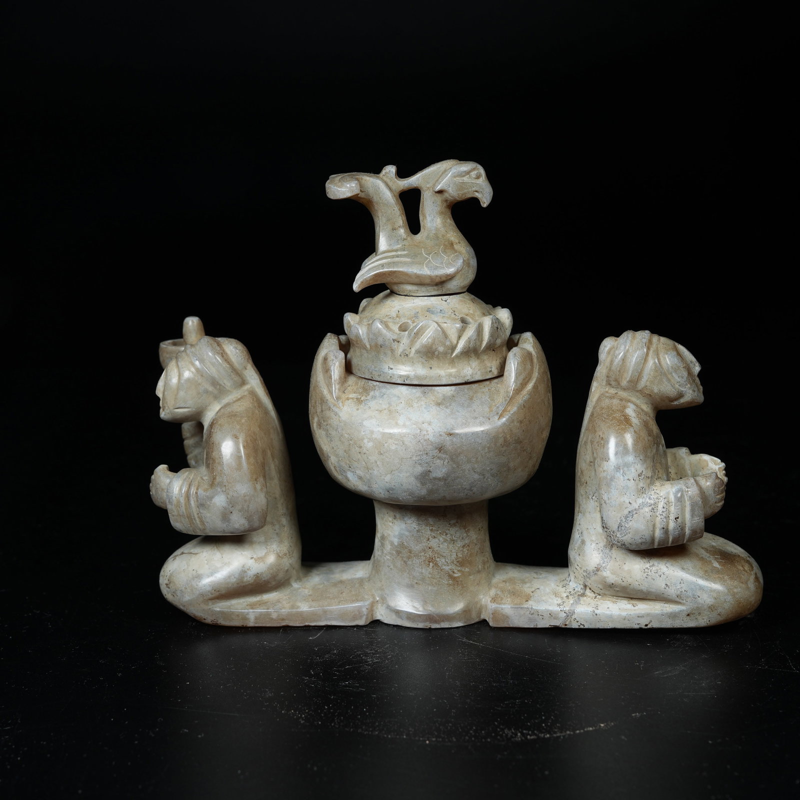 A ARCHAIC JADE INCENSE BURNER WITH DIVINE FIGURE BODY AND PHOENIX KNOB: Archaic Jade Incense Burner with Divine Figure Body and Phoenix Knob