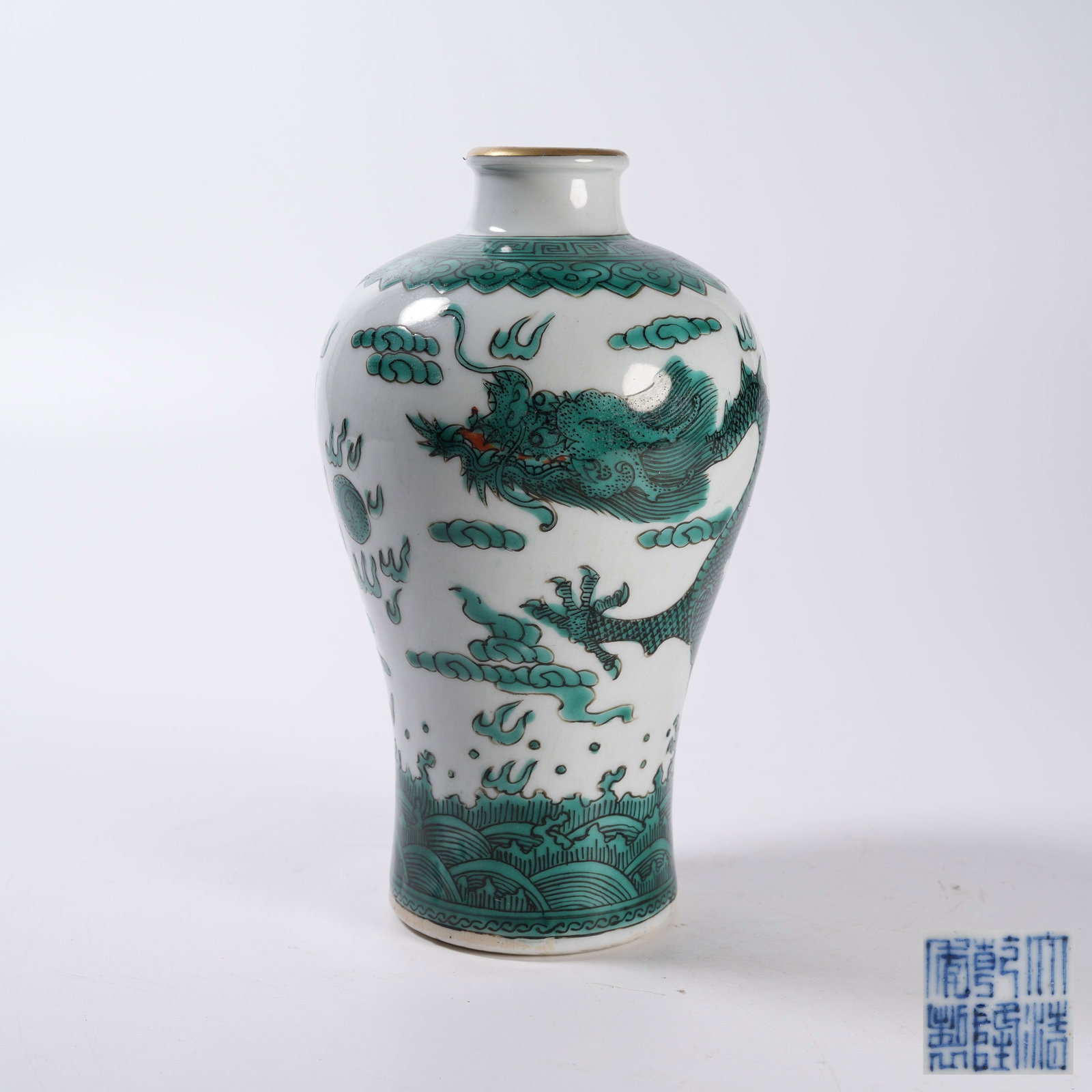 A GREEN GLAZED PRUNUS VASE WITH CLOUD DRAGONS CHASING PEARLS (1 of 9)