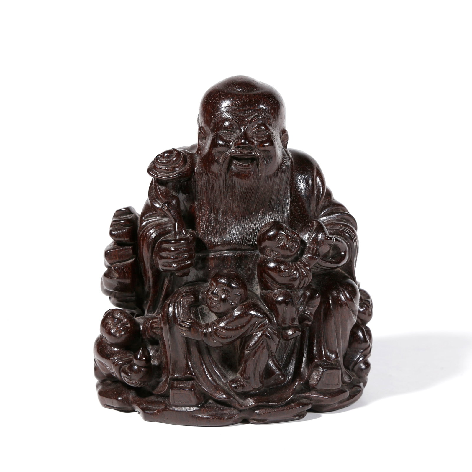 A RED SANDALWOOD CARVED FIGURAL ORNAMENT (1 of 9)