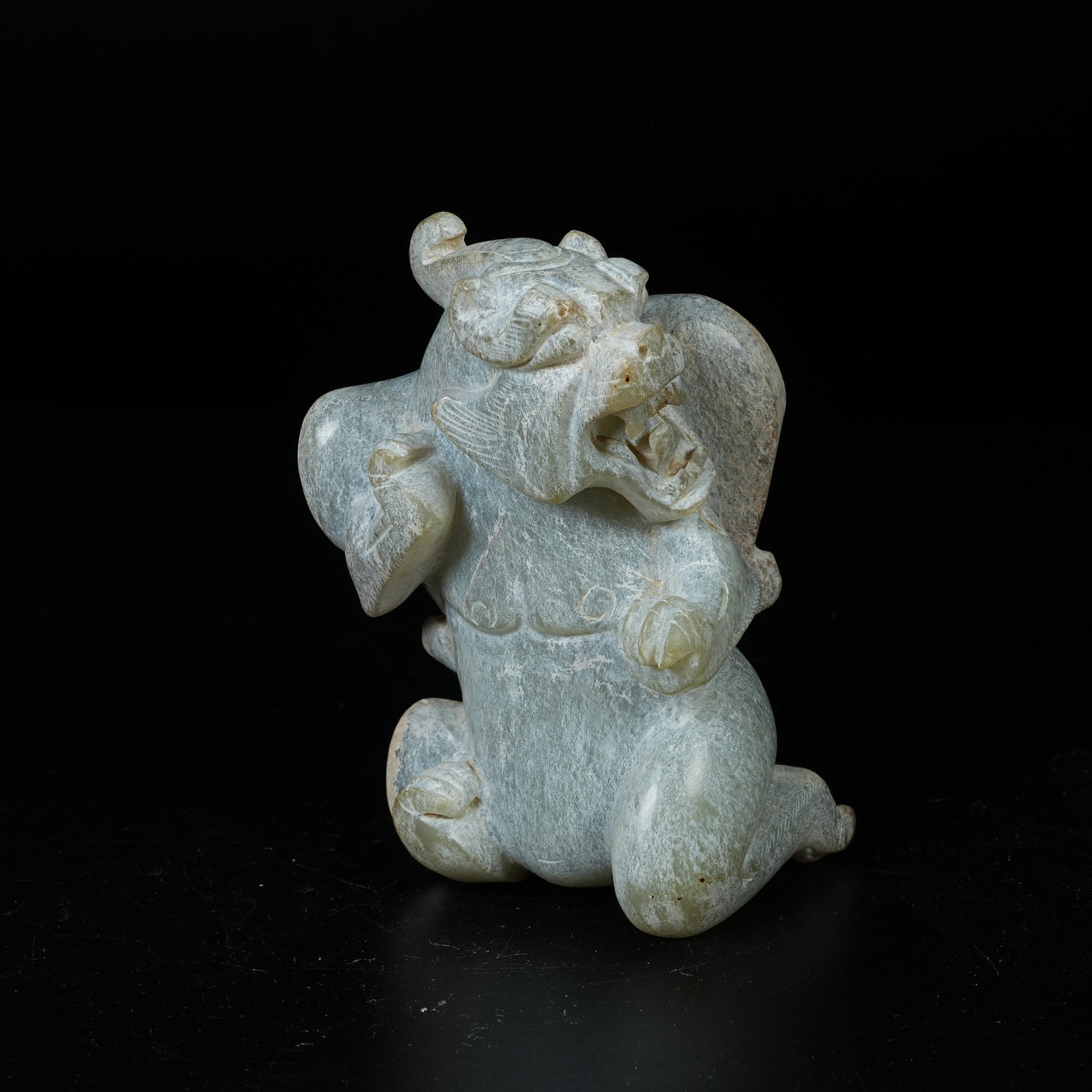 A ARCHAIC JADE DIVINE BEAST ORNAMENT: Archaic Jade Divine Beast Ornament