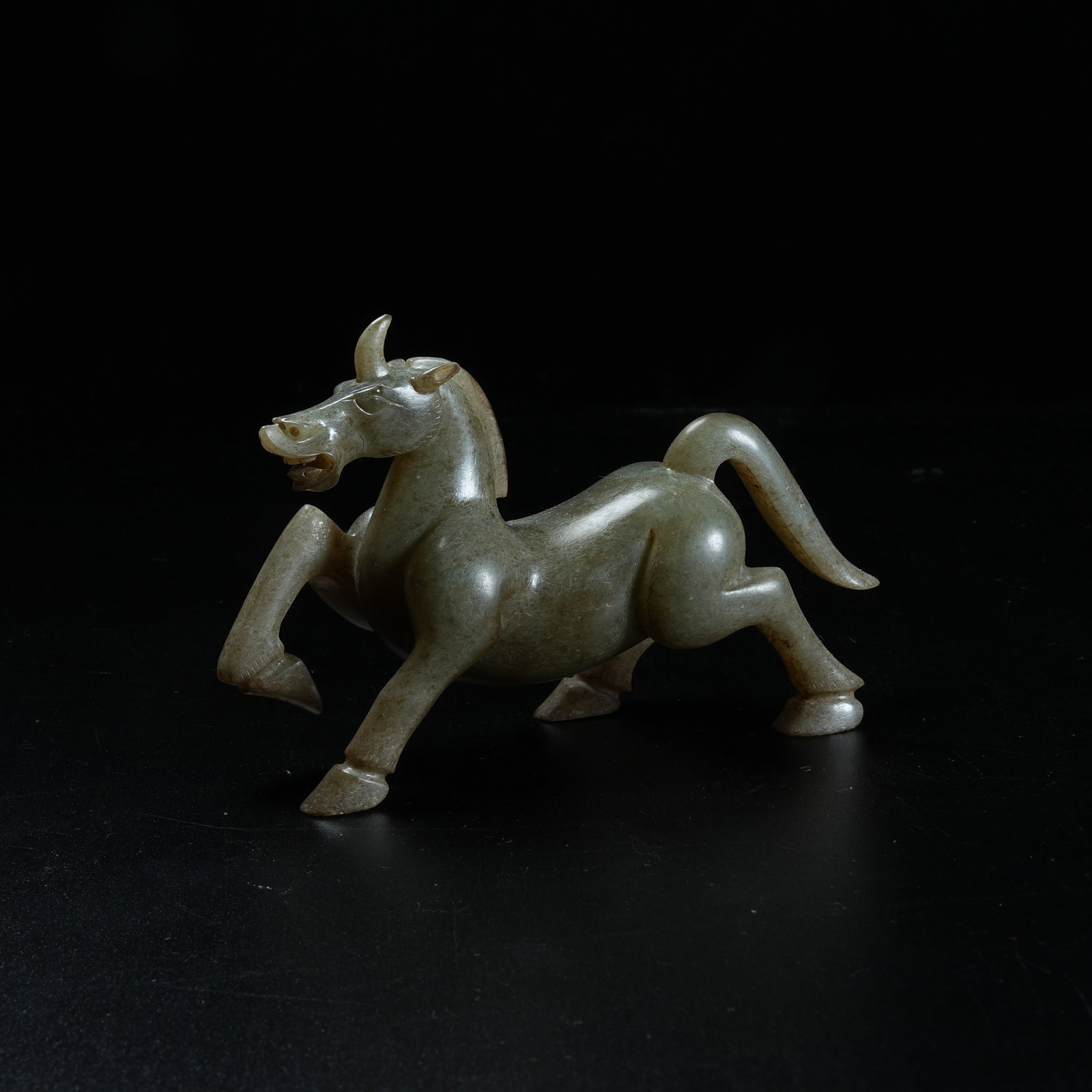 A ARCHAIC JADE HORSE ORNAMENT: Archaic Jade Horse Ornament