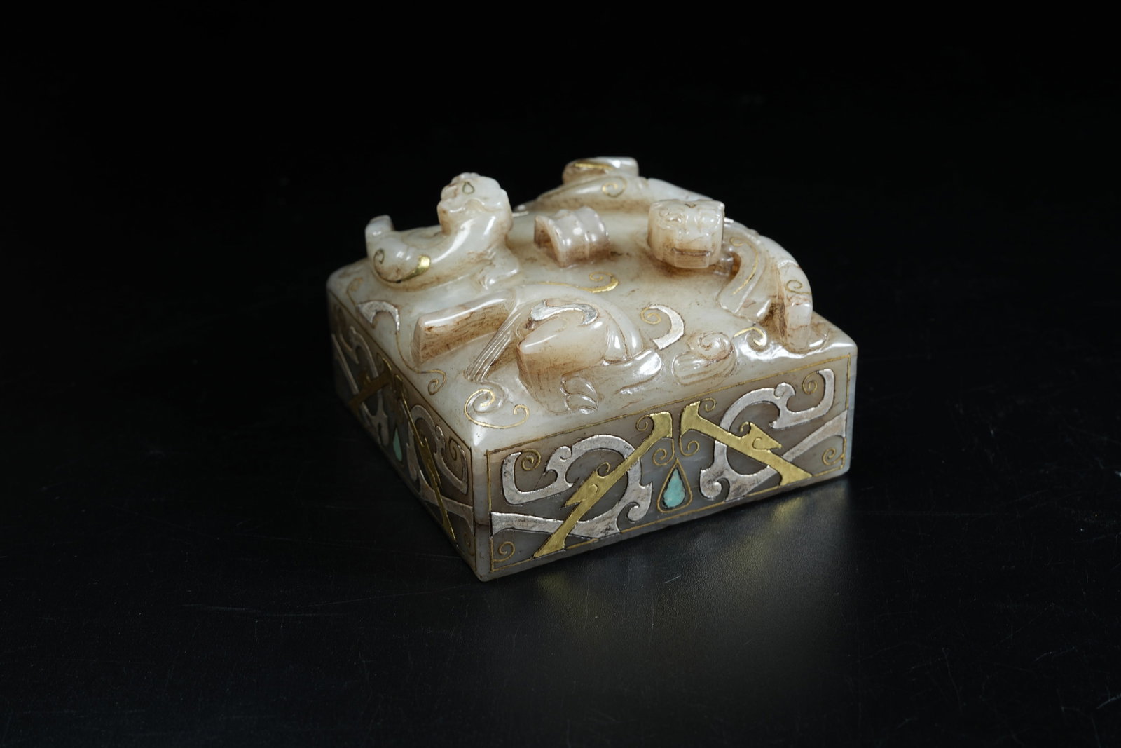 A ANCIENT JADE SEAL WITH CHI DRAGON KNOB INLAID WITH GOLD, SILVER AND GEMSTONES: Ancient Jade Seal with Chi Dragon Knob Inlaid with Gold, Silver and Gemstones