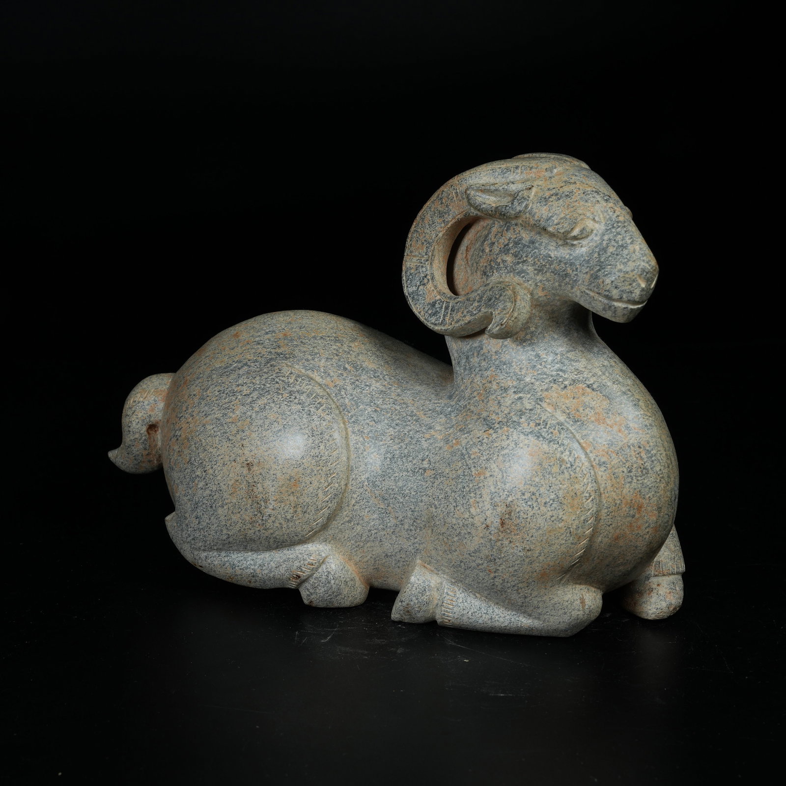 A ARCHAIC JADE RECUMBENT SHEEP ORNAMENT (1 of 9)