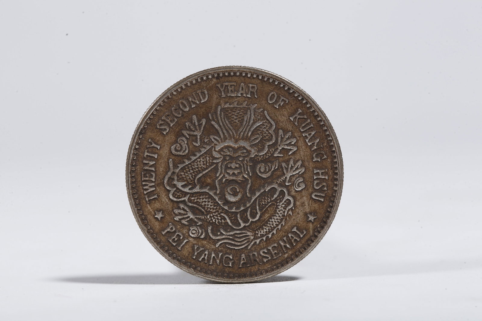 A SILVER DOLLAR COIN - 3