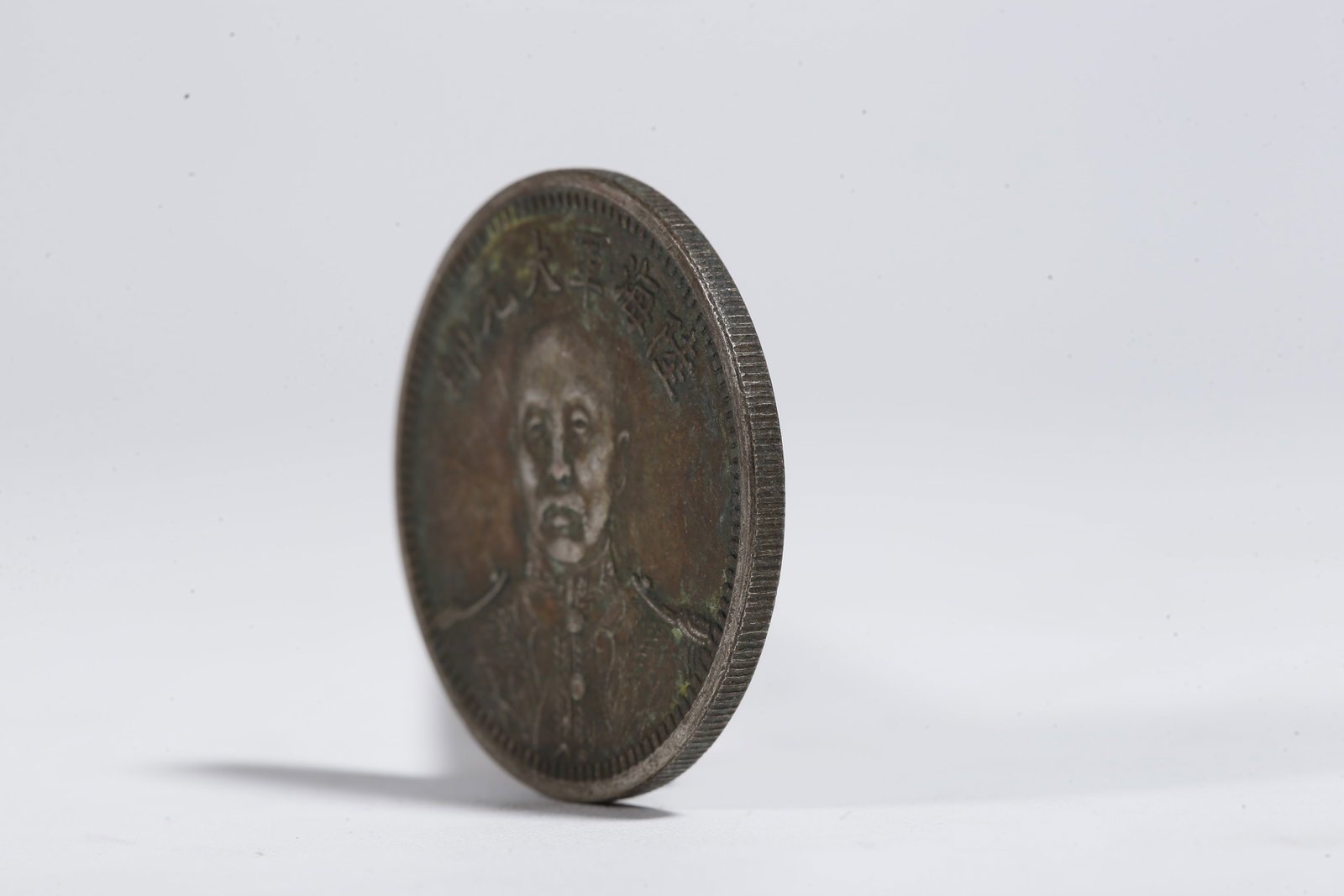 A SILVER DOLLAR COIN - 2