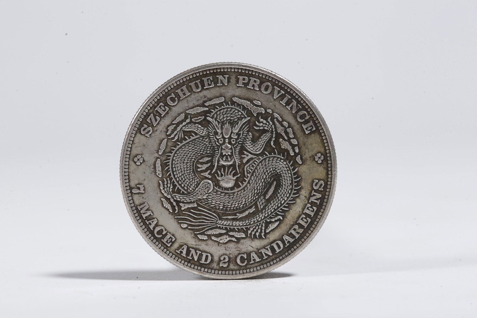 A SILVER DOLLAR COIN - 3