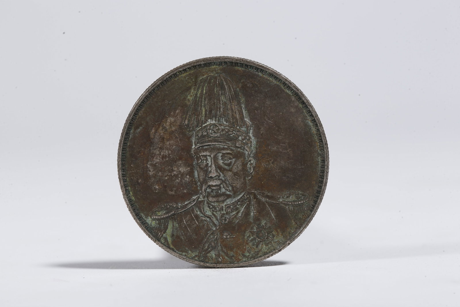 A SILVER DOLLAR COIN - 3