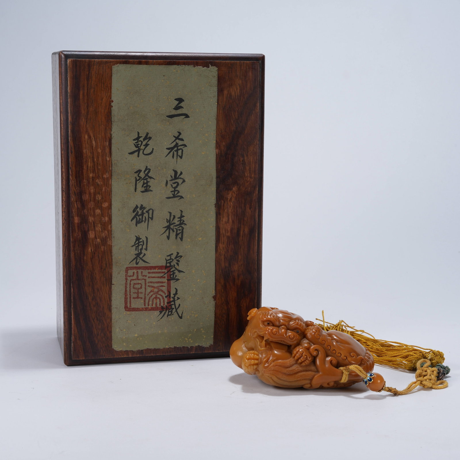 A SHOUSHAN TIANHUANG STONE HAND PIECE IN FORM OF AUSPICIOUS LION: Shoushan Tianhuang Stone Hand Piece in Form of Auspicious Lion