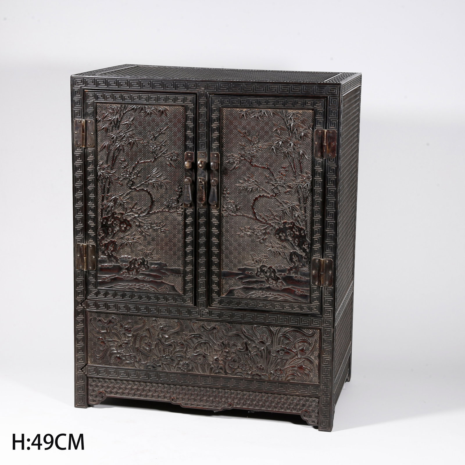 A RED SANDALWOOD CARVED PLUM AND BAMBOO PATTERN CABINET (1 of 10)