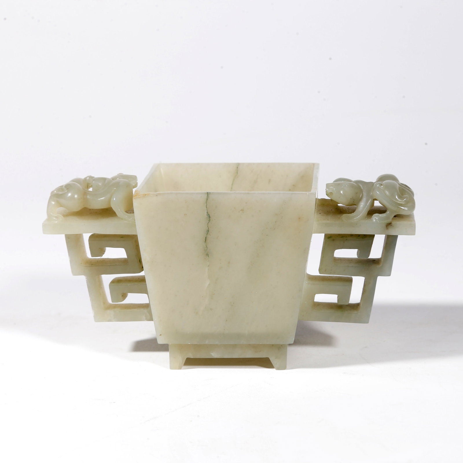 A HETIAN JADE TWO-EARED CUP CARVED WITH DRAGON PATTERN: Hetian Jade Two-eared Cup Carved with Dragon Pattern
