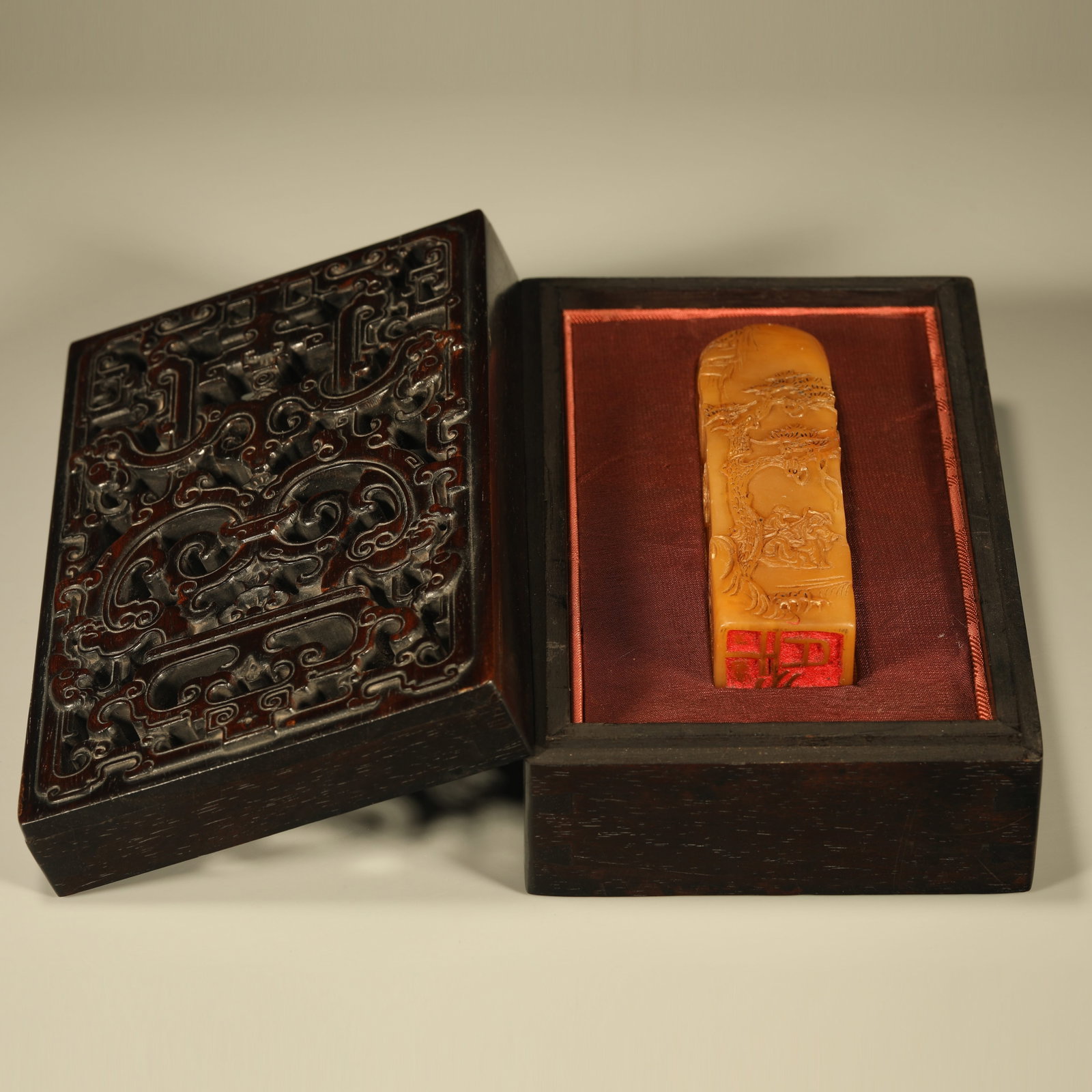 A TIANHUANG STONE SEAL WITH THIN RELIEF LANDSCAPE, FIGURES AND POEM INSCRIPTIONS (1 of 7)