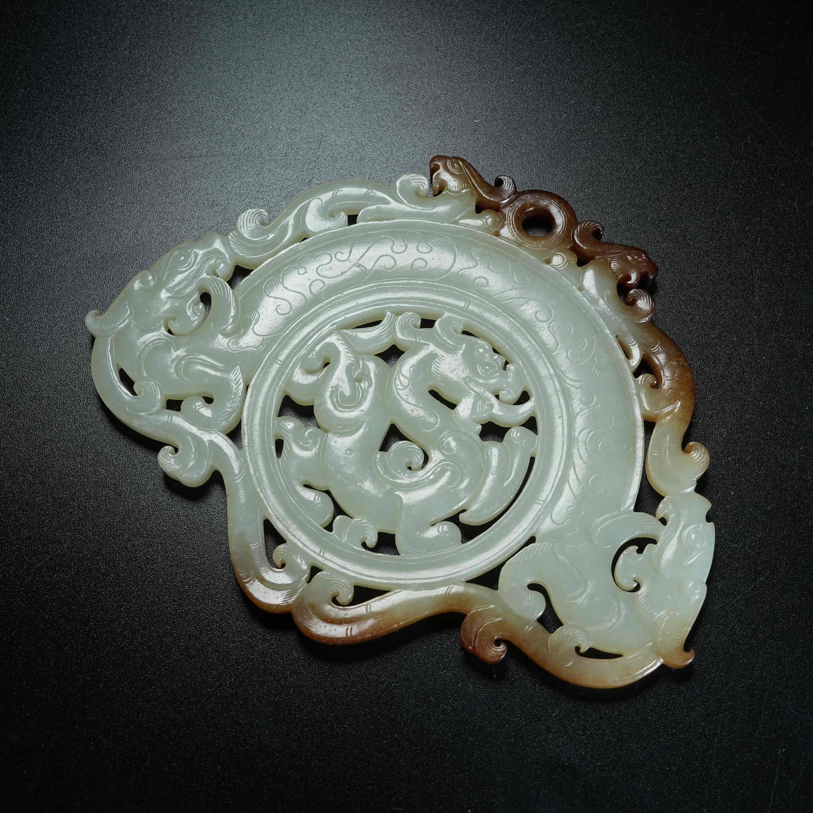 A ARCHAIC JADE PENDANT WITH DRAGON PATTERNS: Archaic Jade Pendant with Dragon Patterns