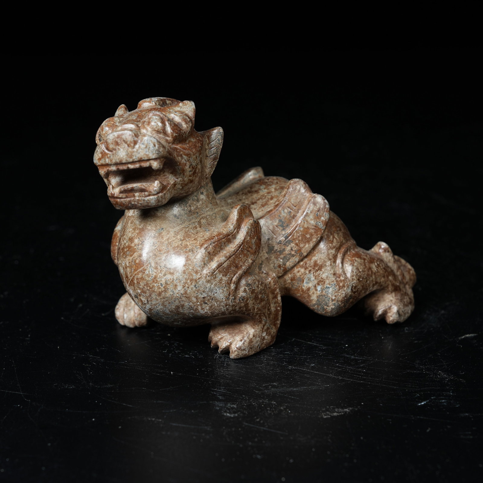 A ARCHAIC JADE RECUMBENT BEAST ORNAMENT: Archaic Jade Recumbent Beast Ornament