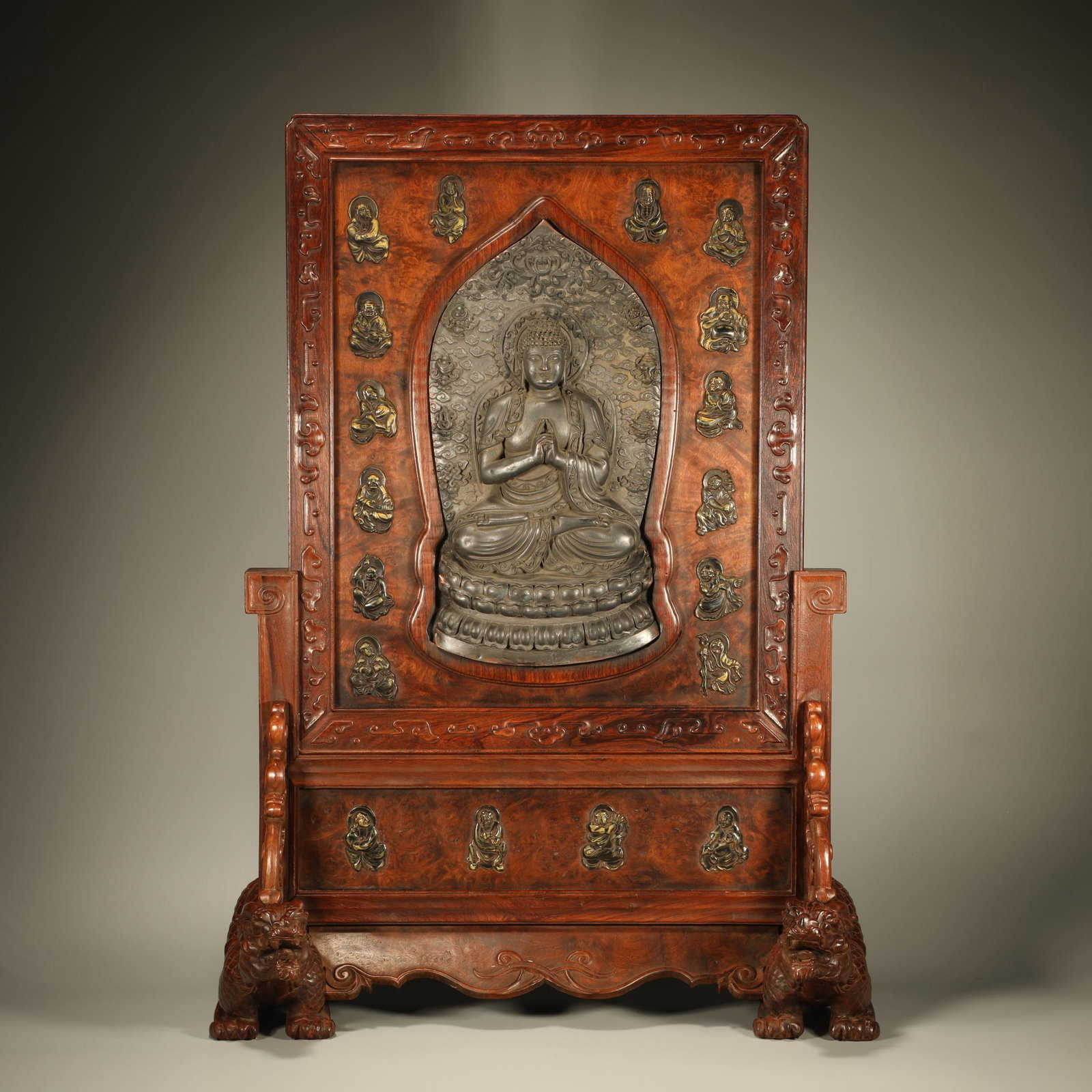A HUANGHUALI WOOD SCREEN INLAID WITH BRONZE BUDDHA AND CARVED HEART SUTRA: Huanghuali Wood Screen Inlaid with Bronze Buddha and Carved Heart Sutra