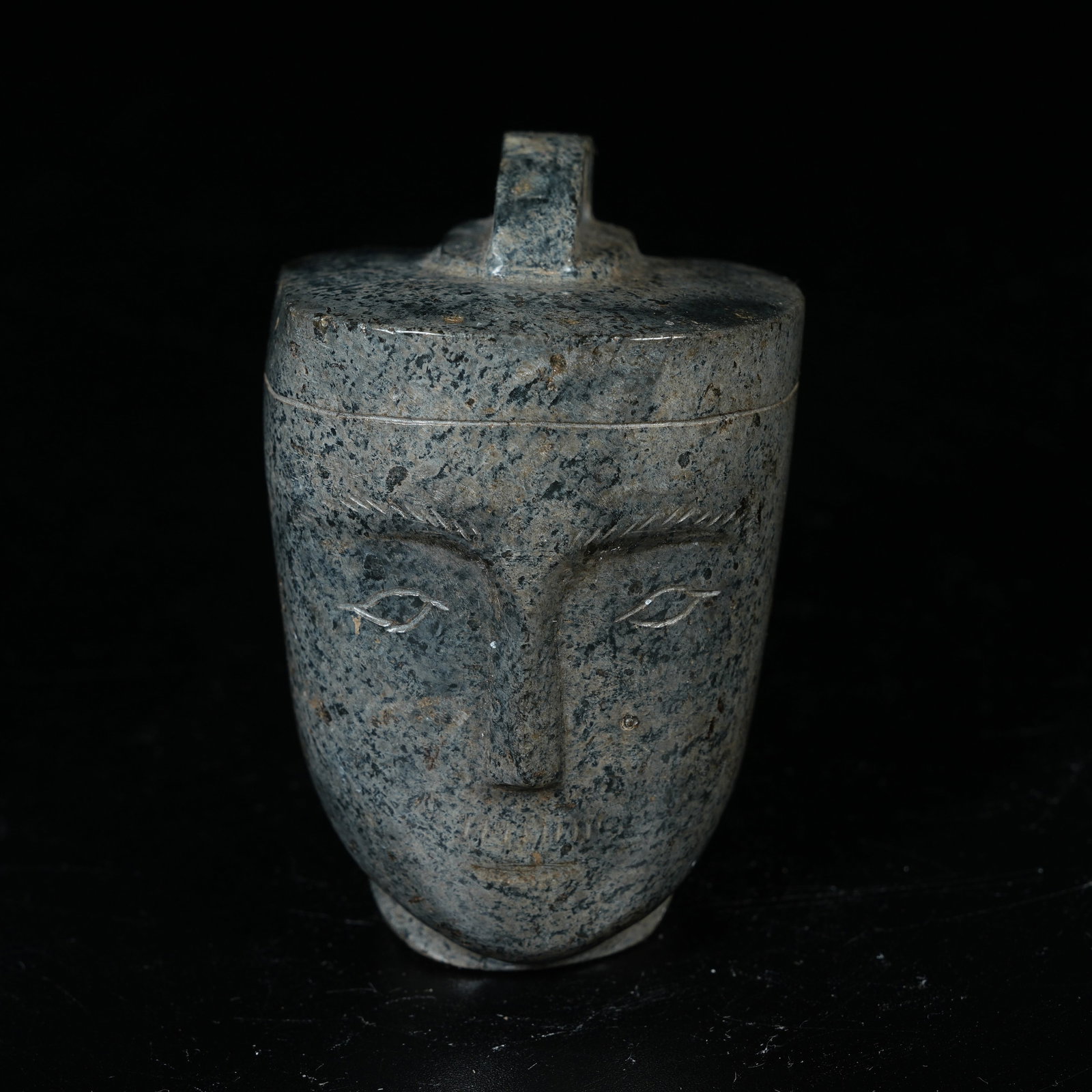 A ARCHAIC JADE FIGURINE HEAD (1 of 8)