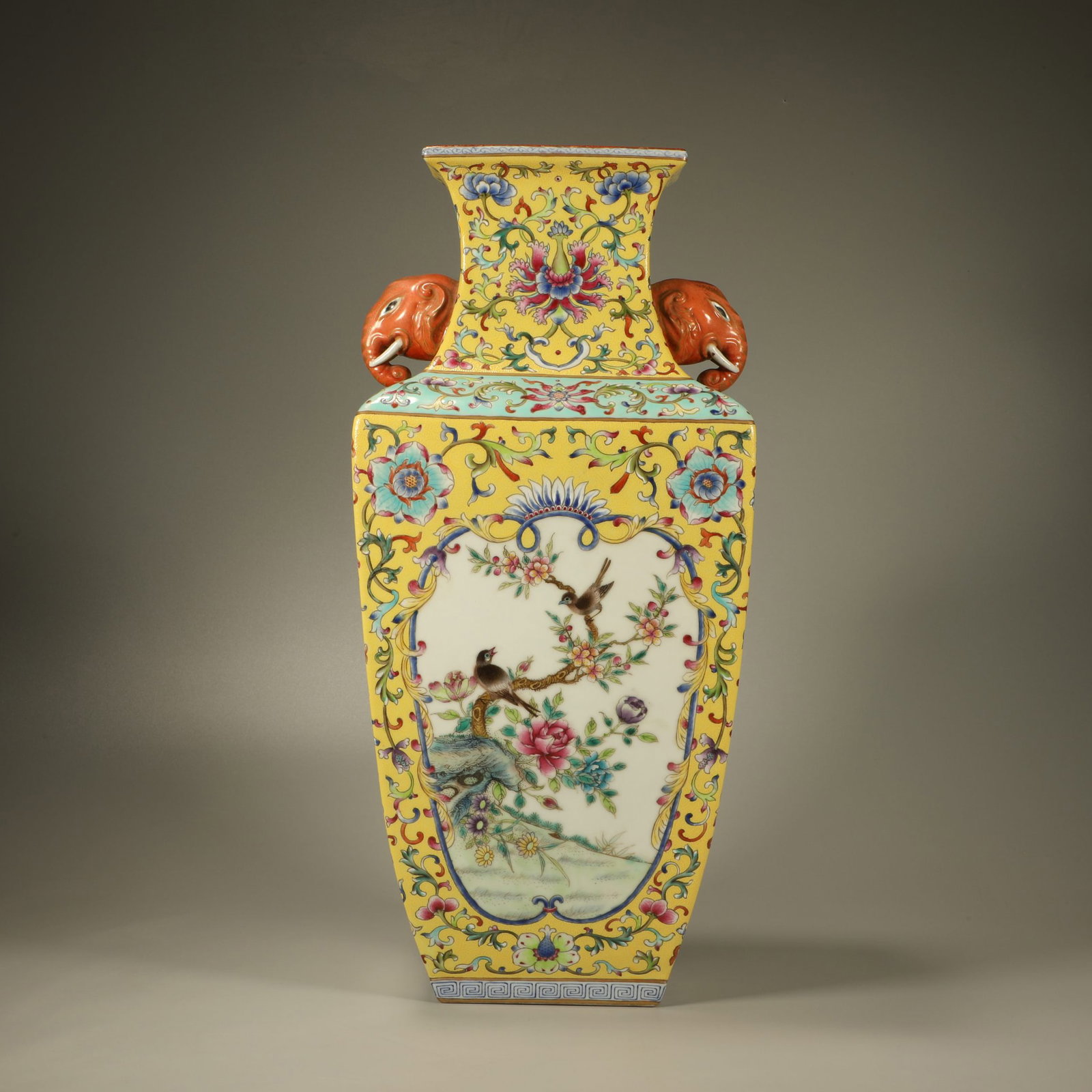 A FAMILLE ROSE ELEPHANT-EAR VASE WITH RESERVE PANELS OF FLOWERS AND POEMS: Famille Rose Elephant-ear Vase with Reserve Panels of Flowers and Poems